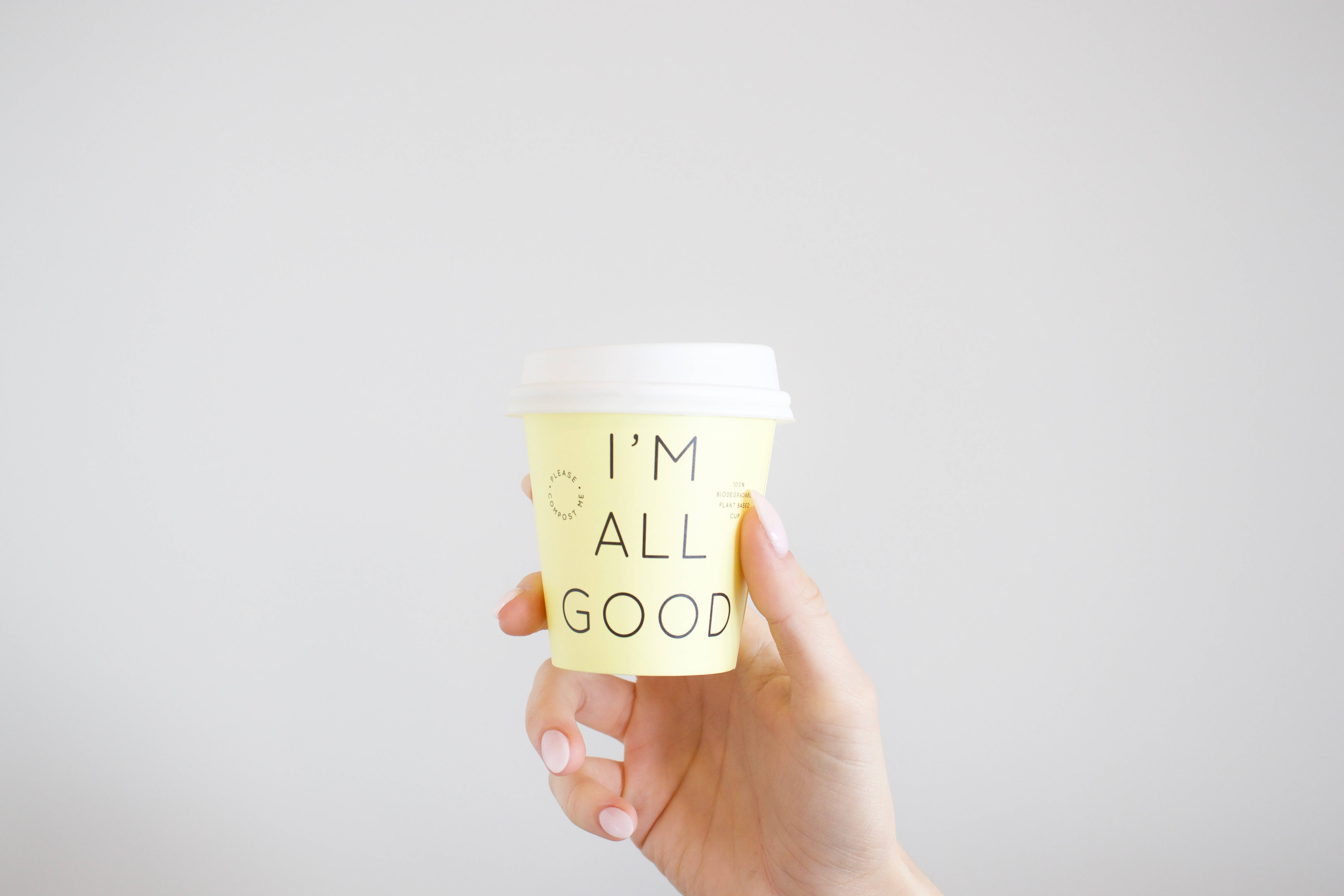 pale yellow coffee cup, bold black text, I'M ALL GOOD, 5K Desktop Wallpaper