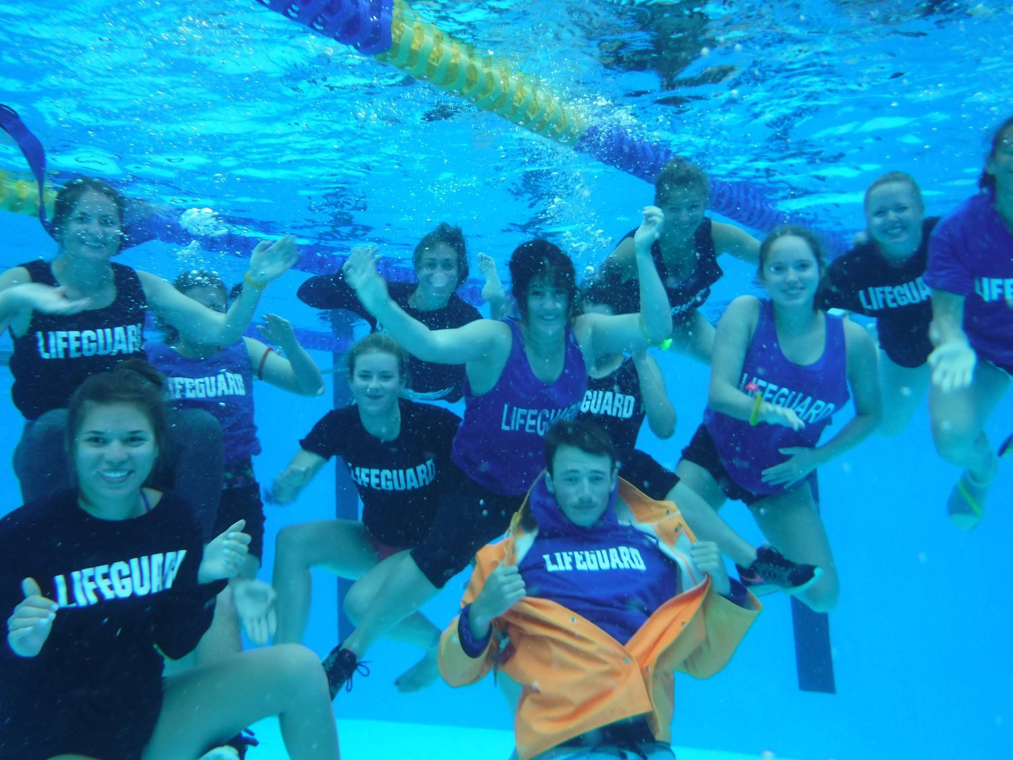 lifeguard, purple and black uniforms, bright blue pool, Full HD Desktop Wallpaper
