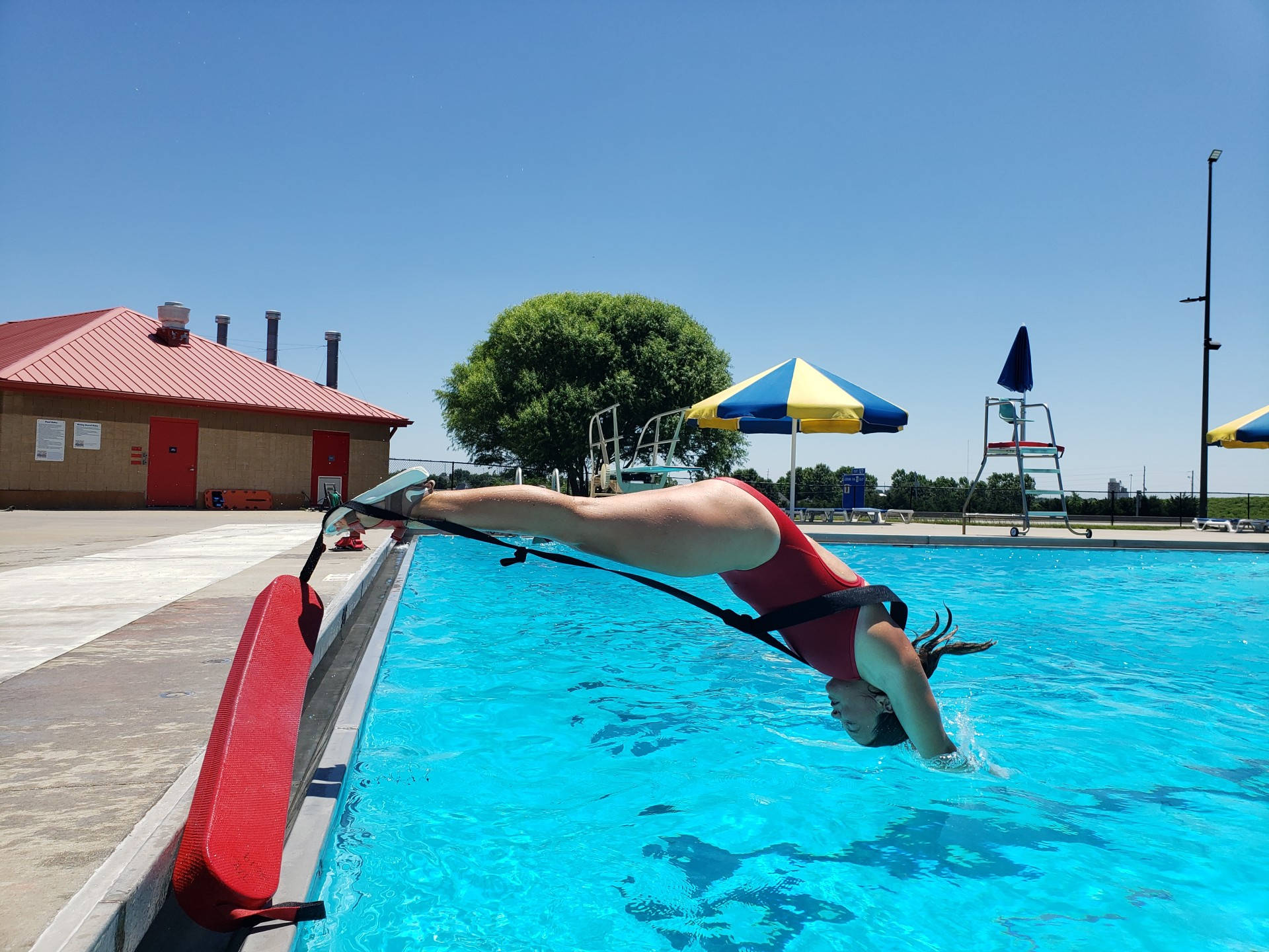Lifeguard Training Drill For Deep Water Rescue, red swimsuit, bright blue pool, Full HD Desktop Wallpaper