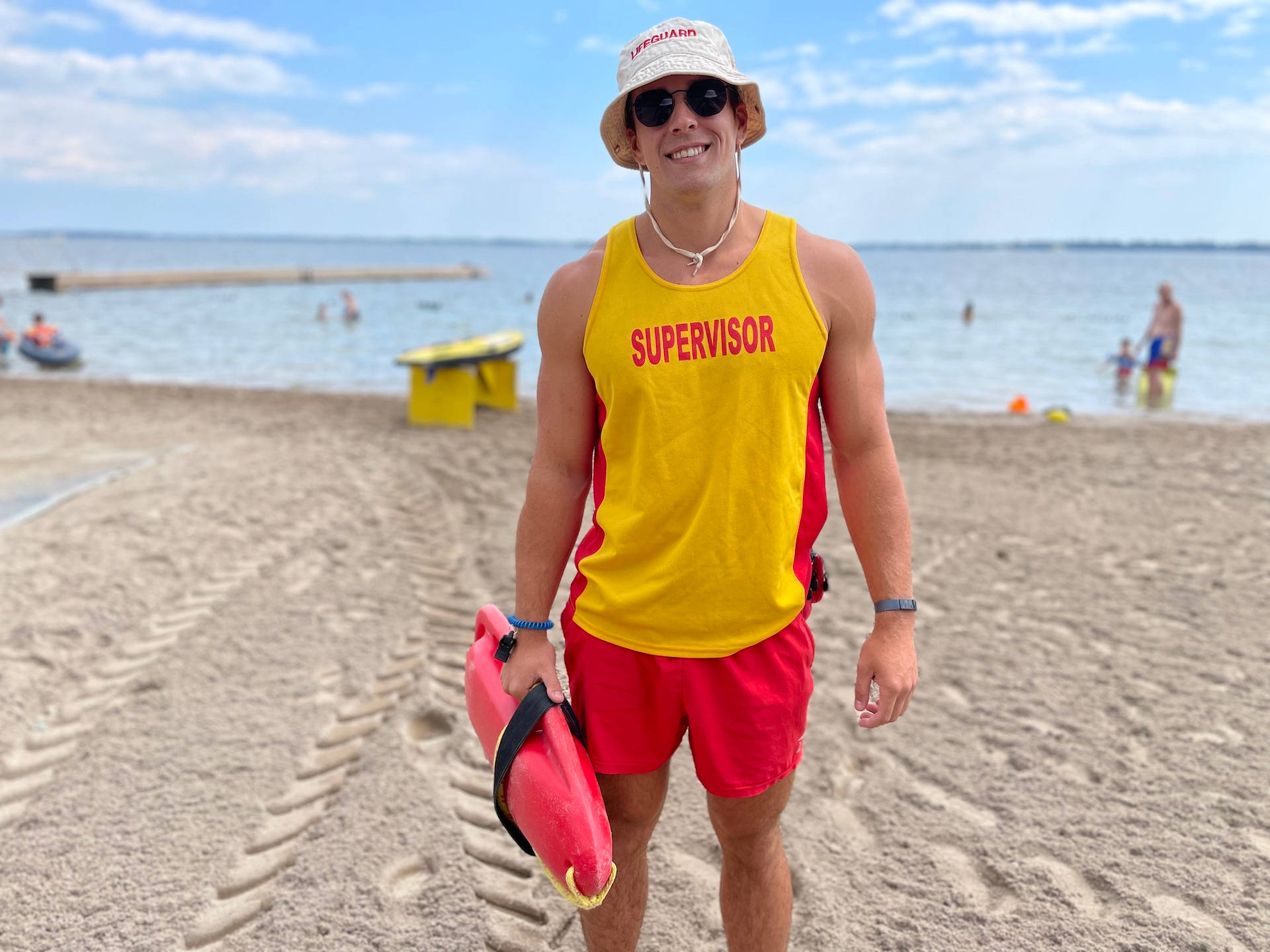 handsome lifeguard, yellow tank top, red shorts, Full HD Desktop Wallpaper