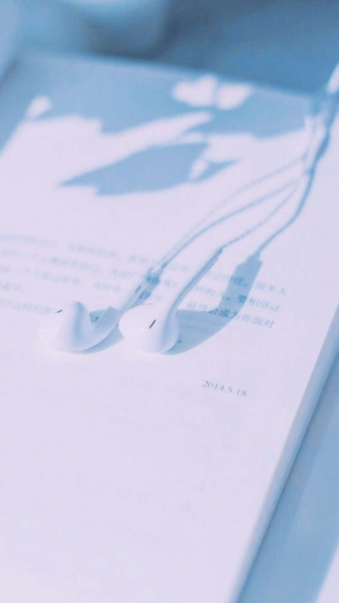 light blue, white earphones, book page, HD Phone Wallpaper