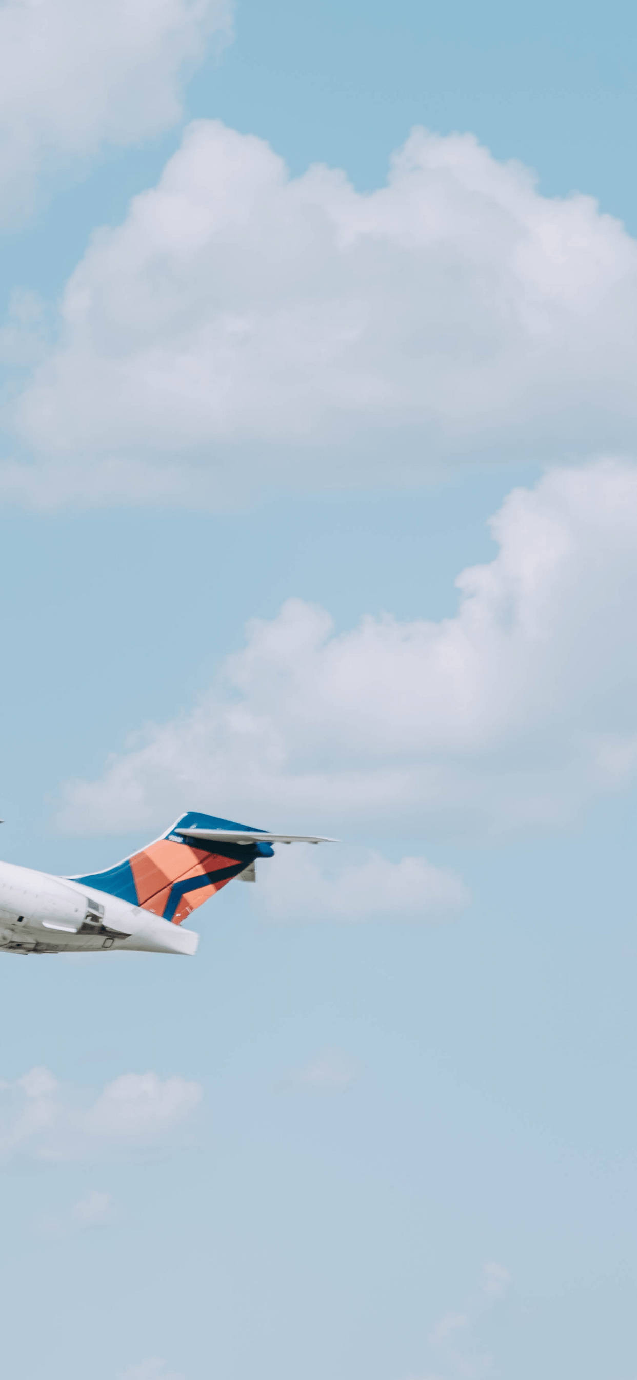 airplane tail, blue orange livery, pale blue sky, 2K Phone Wallpaper