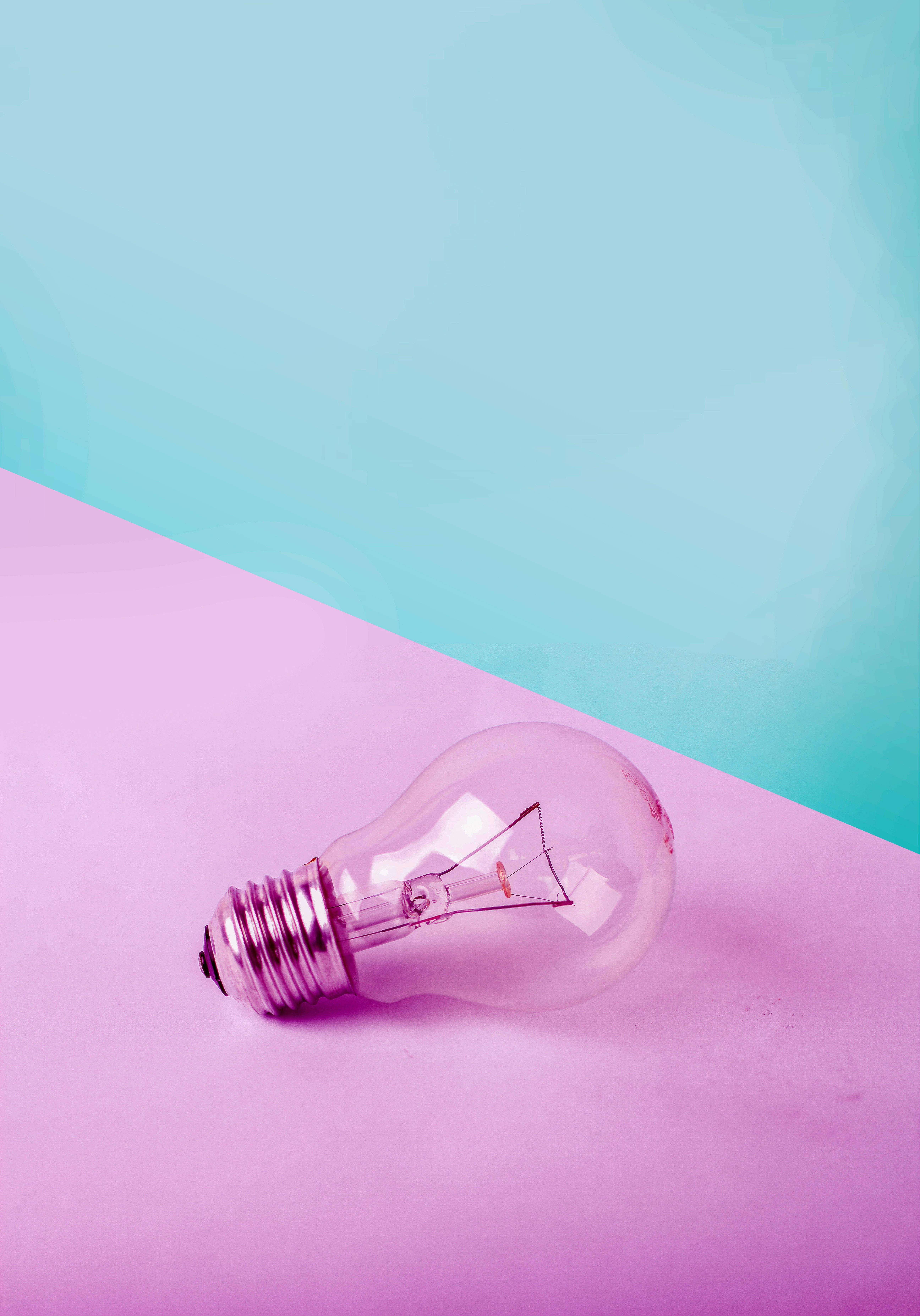pastel color blue pink bulb, vibrant pink surface, soft teal background, 5K Phone Wallpaper