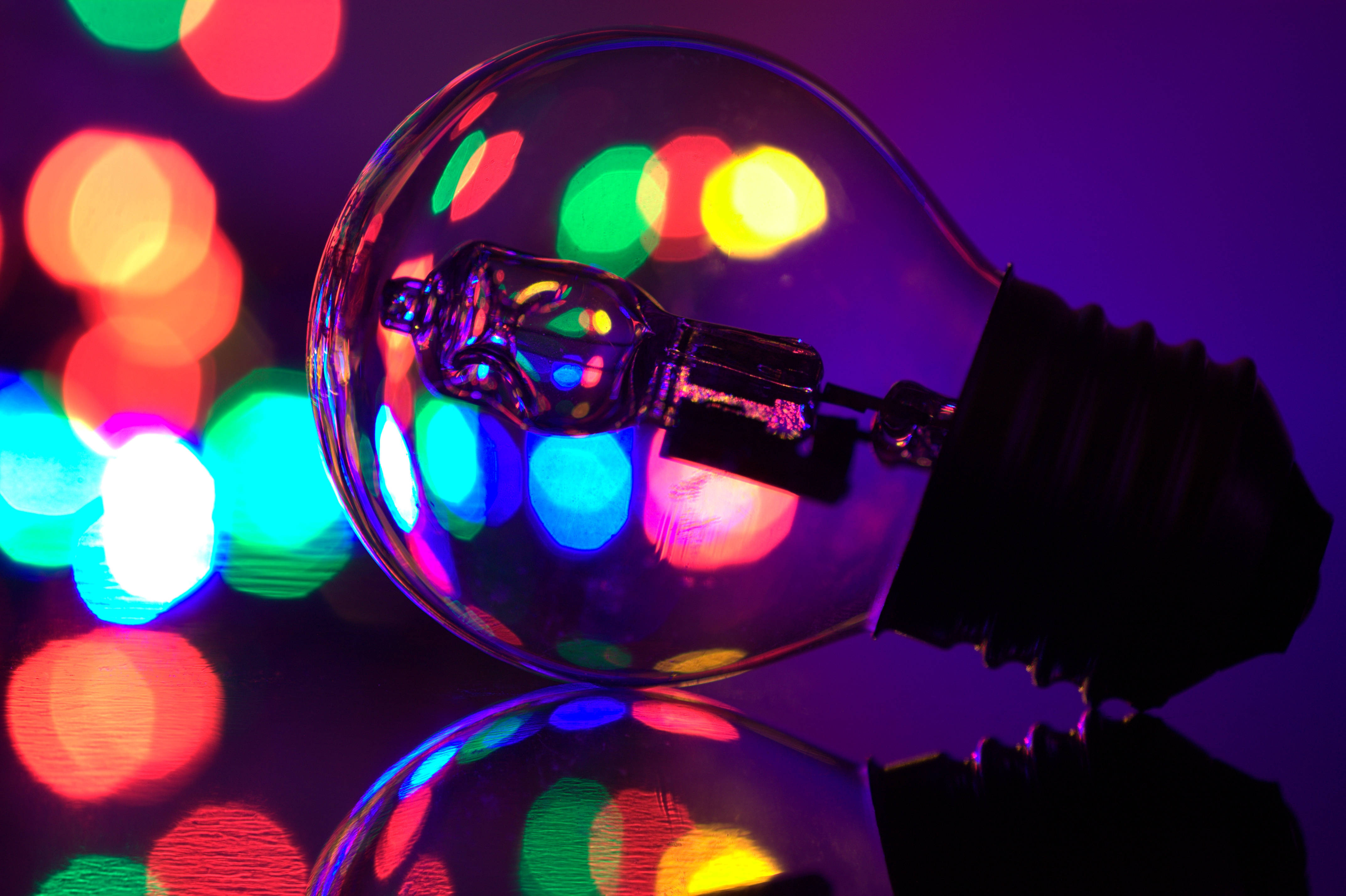 colorful bokeh, glowing light bulb, deep purple background, 4K Desktop Wallpaper