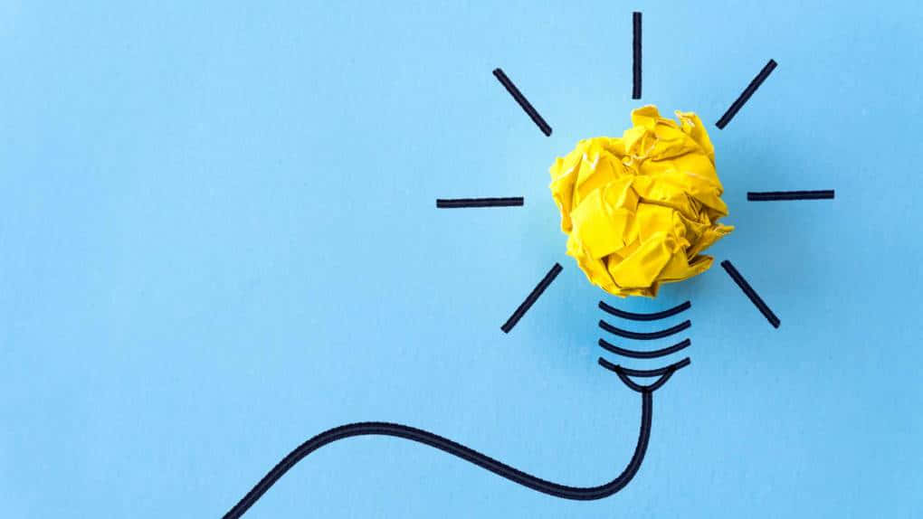 yellow paper ball, hand-drawn lightbulb outline, solid blue background, SD Desktop Wallpaper