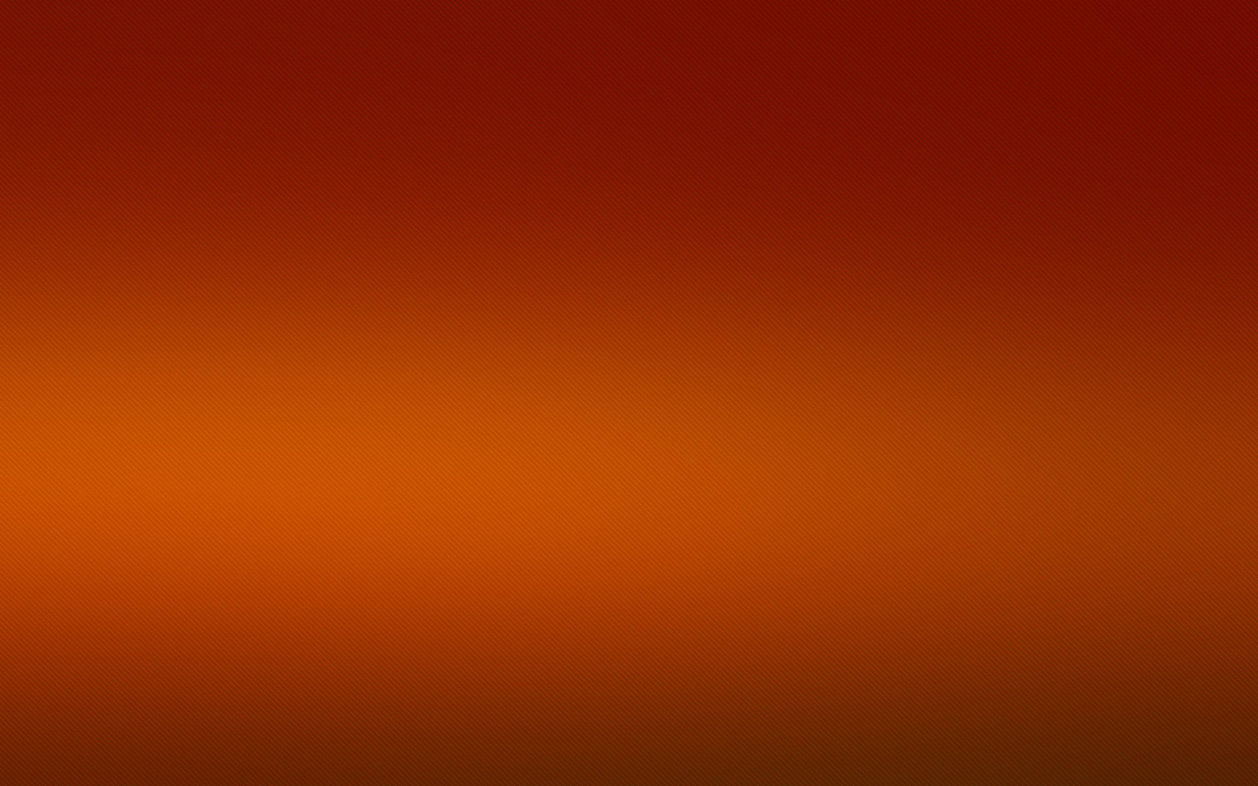 Solid Orange, deep red to warm orange, subtle textured pattern, 2K Desktop Wallpaper