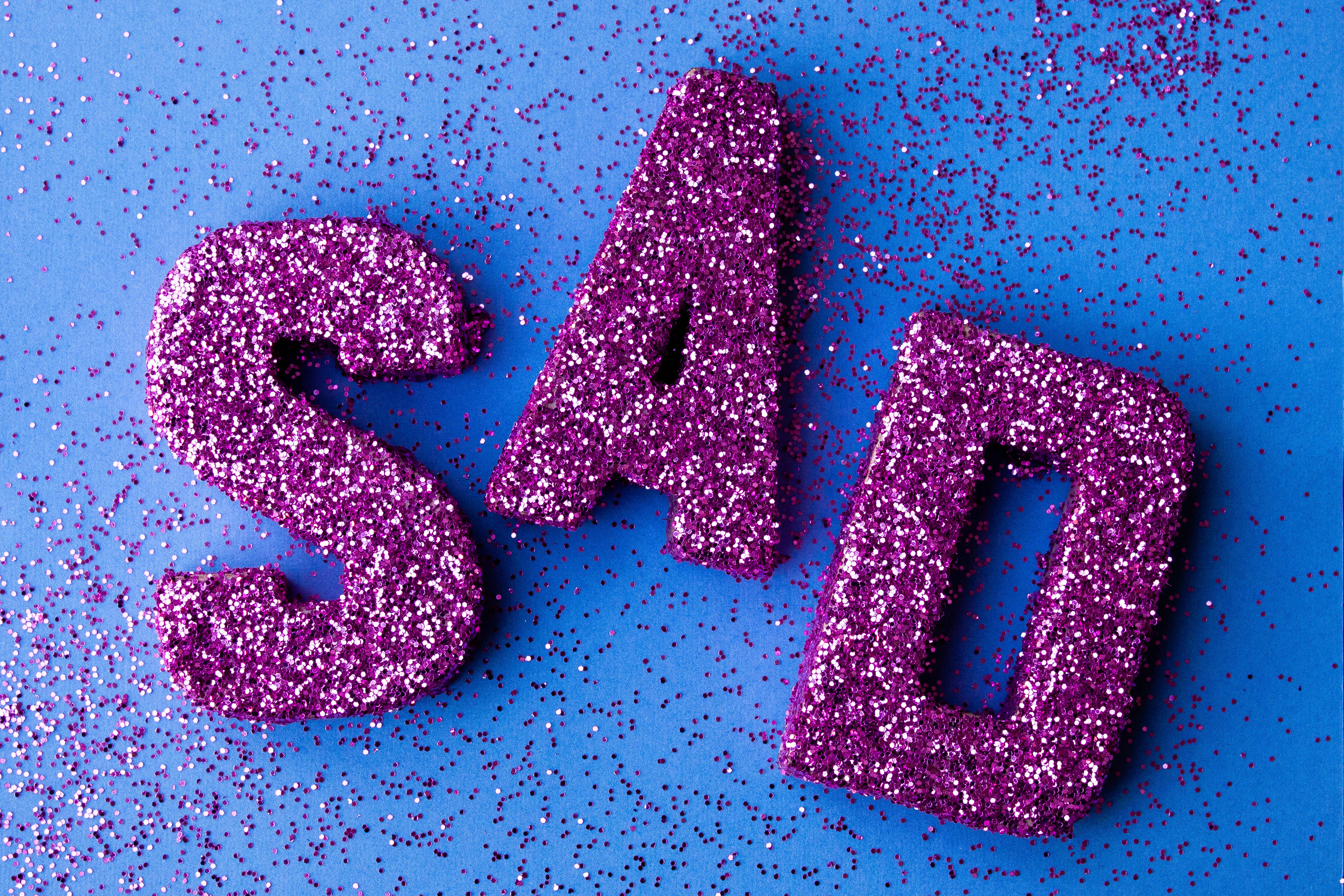 SAD, light purple glitter, vibrant blue background, 4K Desktop Wallpaper