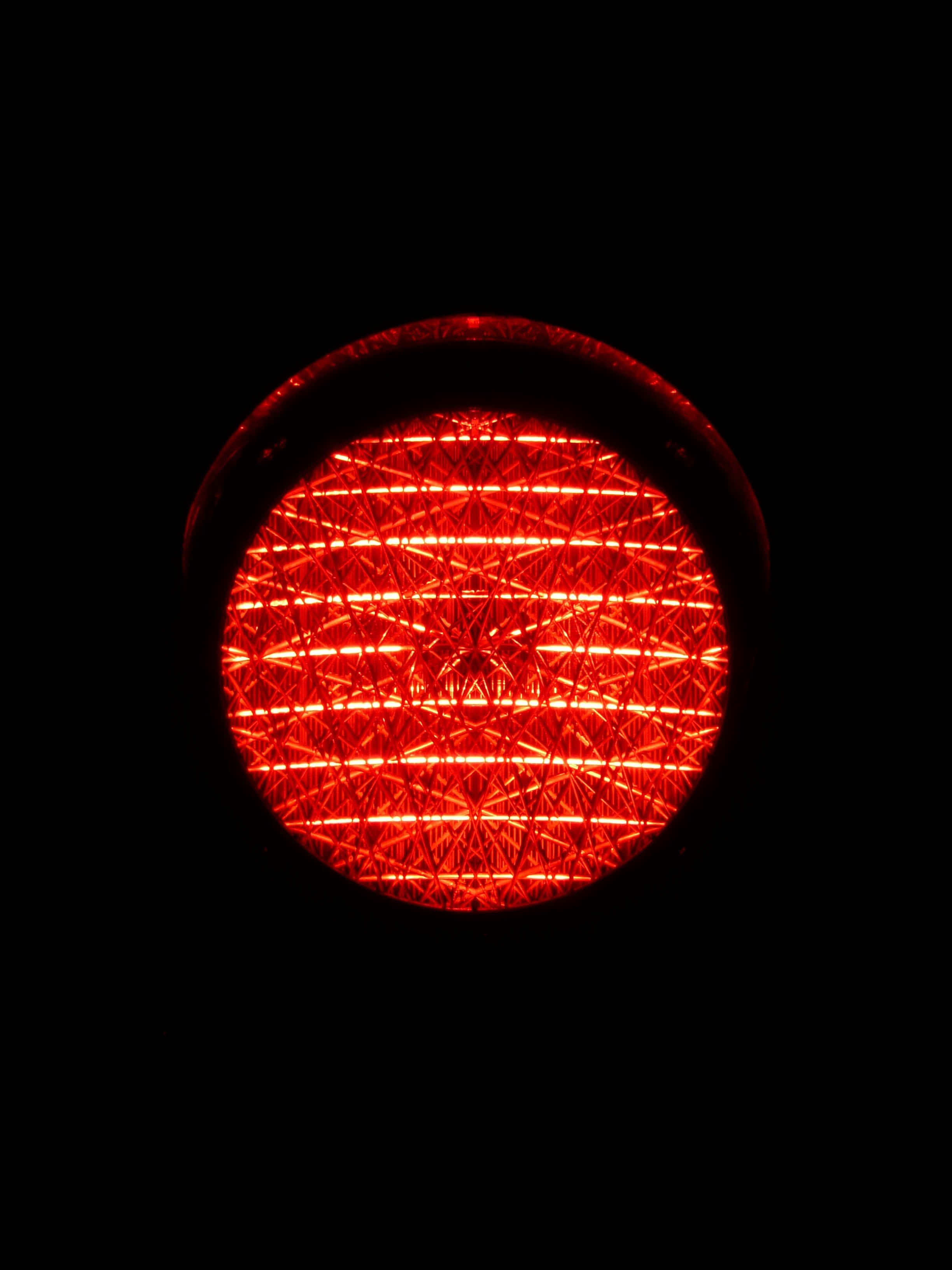 light red, glowing red circular light, intricate grid patterns, 2K Phone Wallpaper