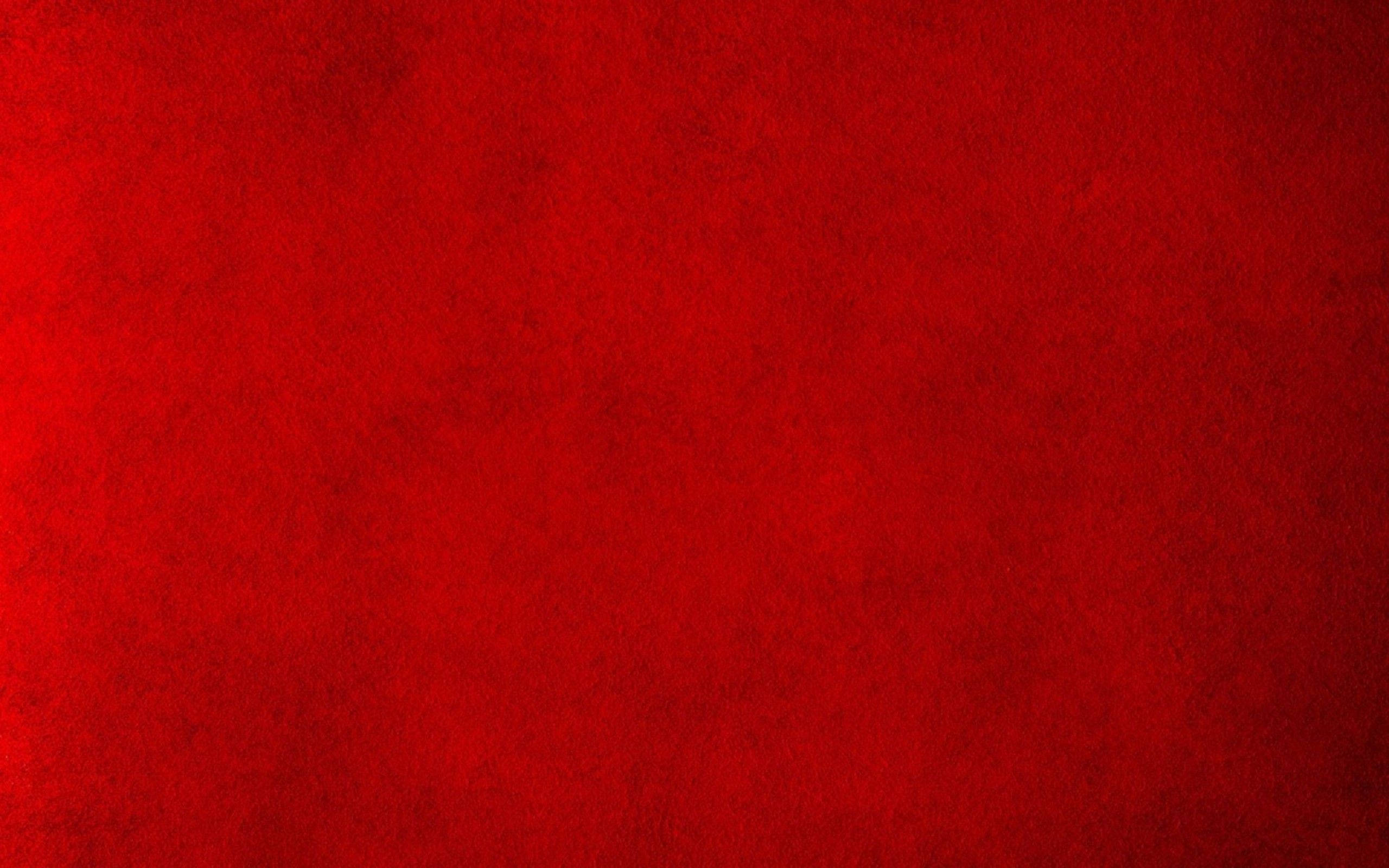 Vibrant Red Background, rich textured red surface, subtle variations in tone and depth, 2K Desktop Wallpaper