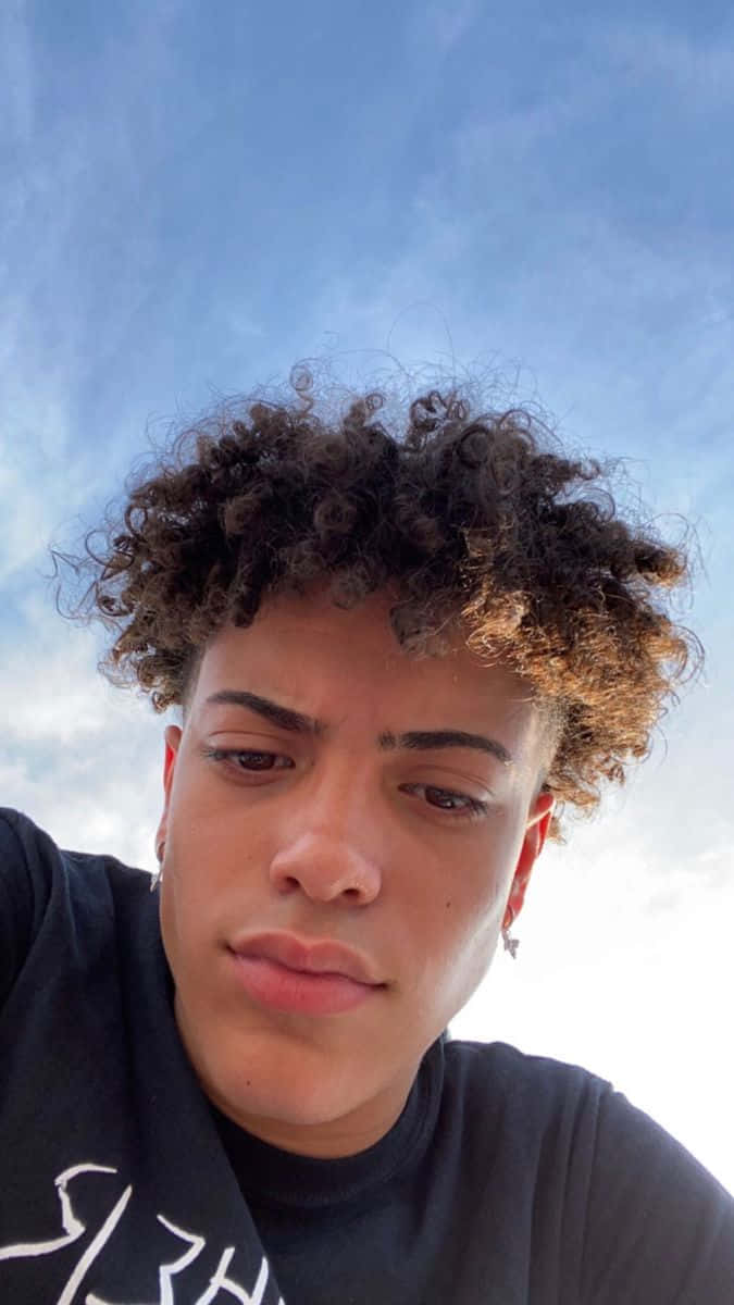 light skinned boy, curly hair, bright blue sky, SD Phone Wallpaper
