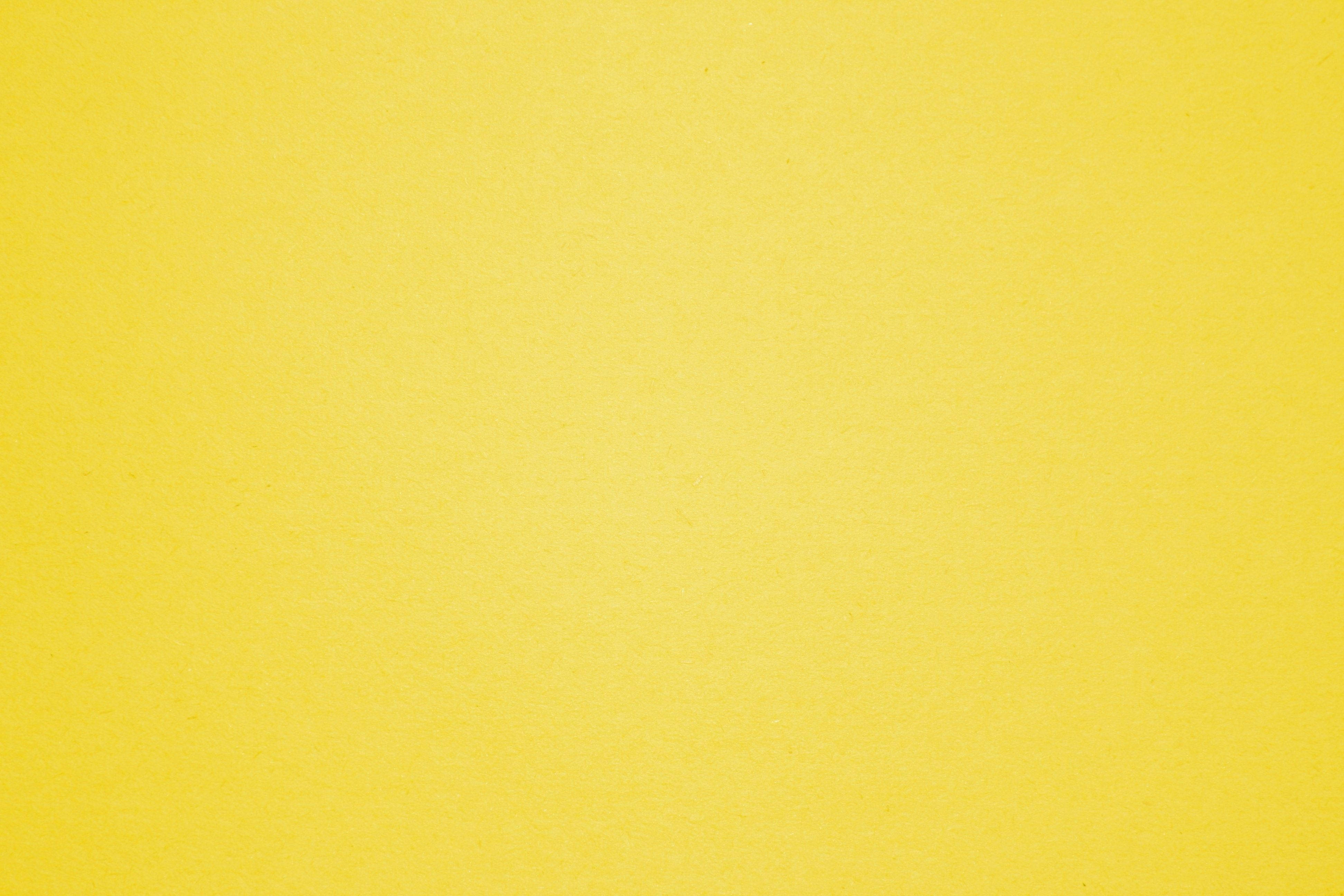 smooth textured yellow paper surface, subtle grain, even lighting, 4K Desktop Wallpaper