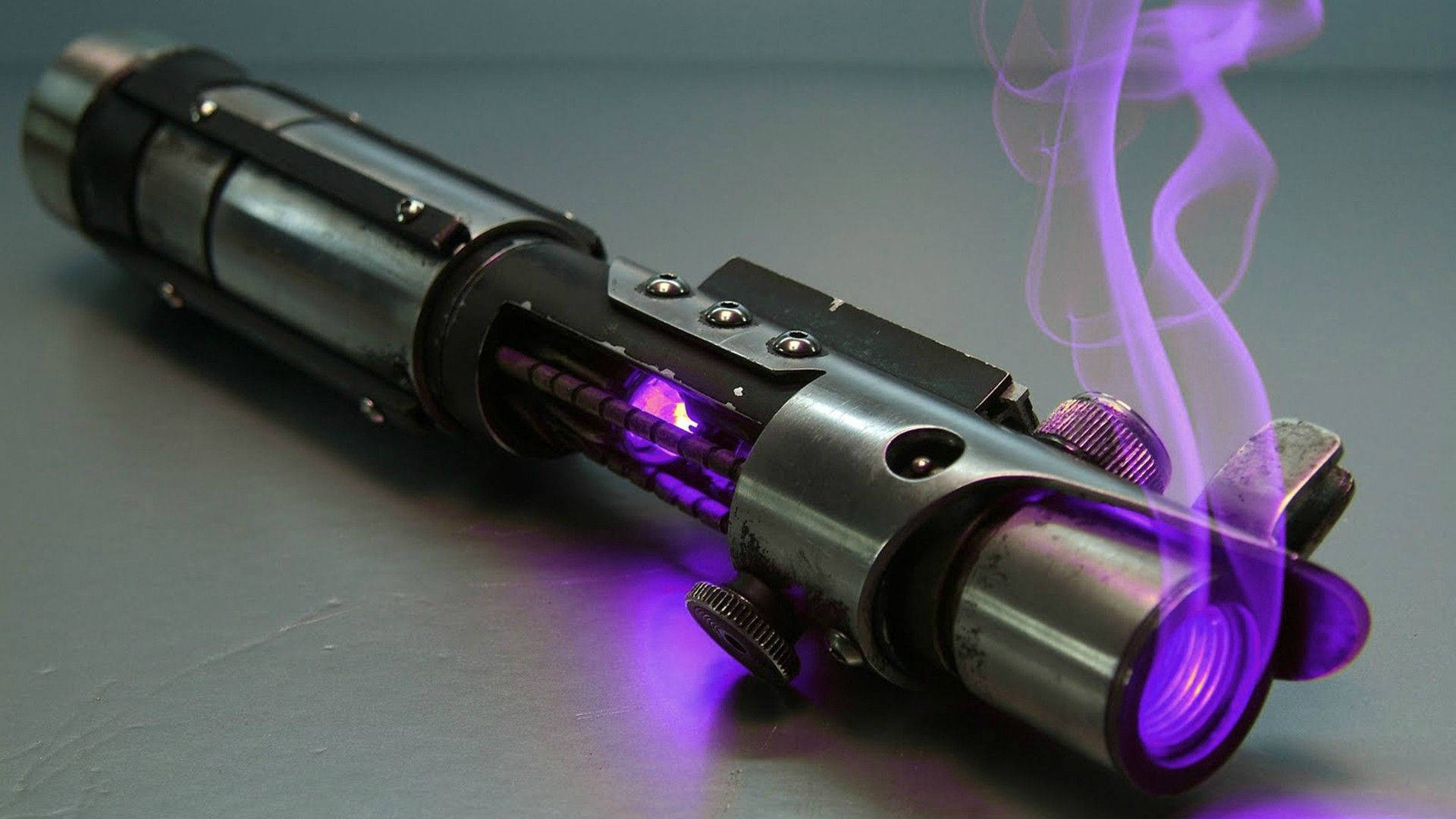 purple lightsaber, glowing blade, smoke rising from its hilt, Full HD Desktop Wallpaper