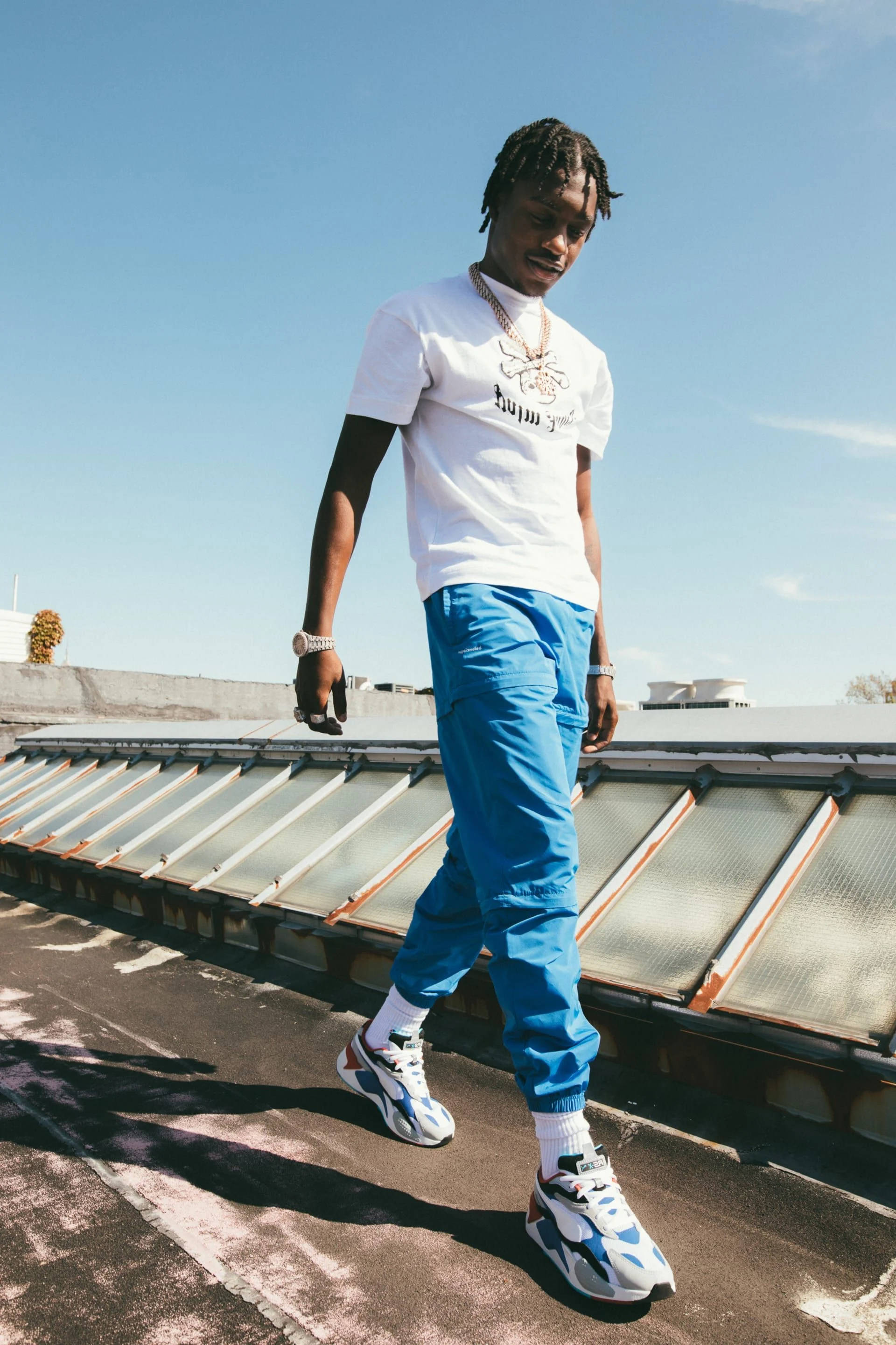 Lil Tjay, sunlit rooftop, glass skylights, 2K Phone Wallpaper