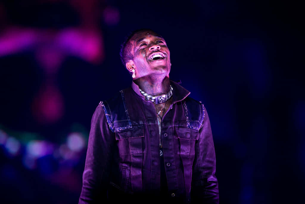 Lil Uzi Vert, vibrant purple stage lights, dark blurred background, SD Desktop Wallpaper