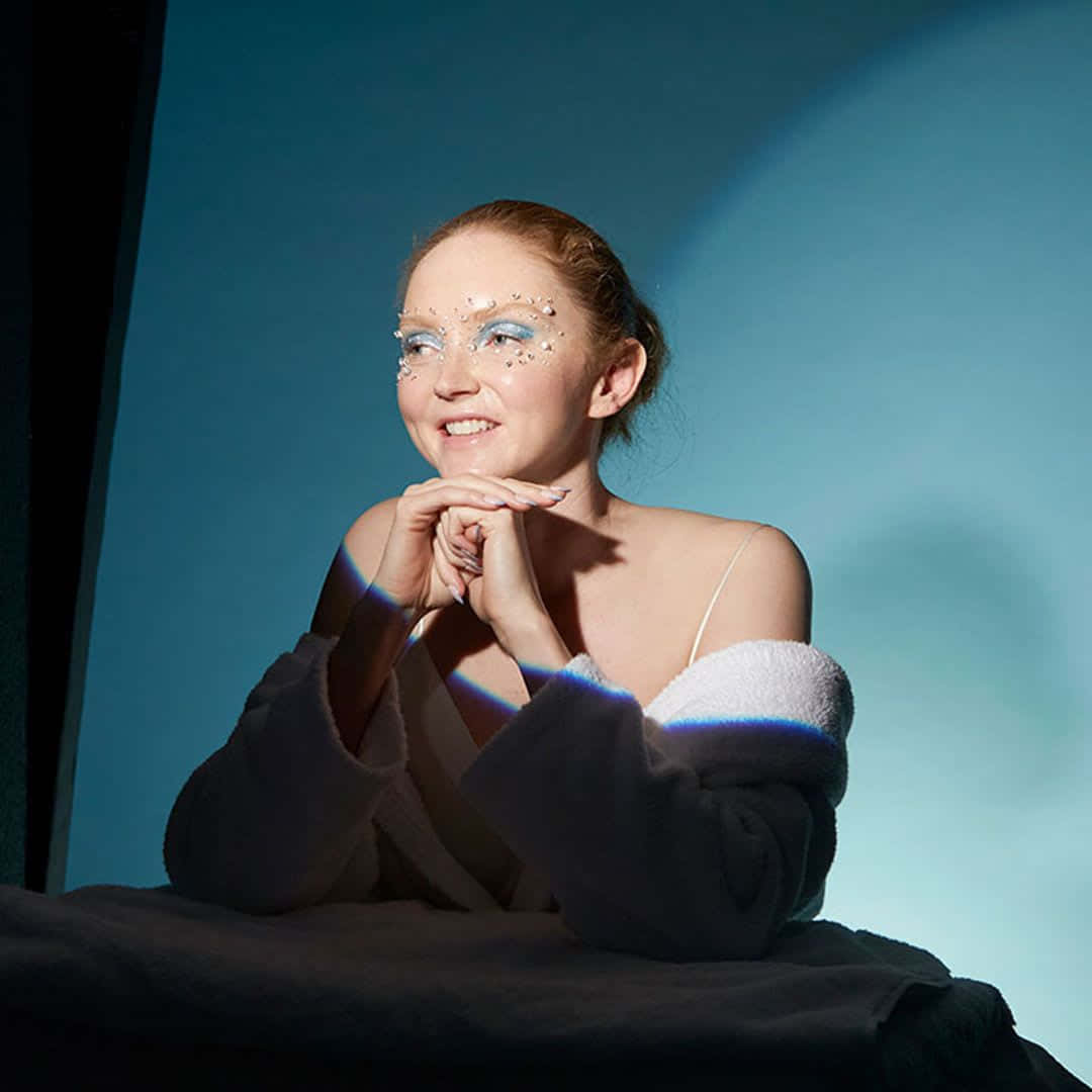 Lily Cole, glittery blue eye makeup, soft smile, SD Desktop Wallpaper