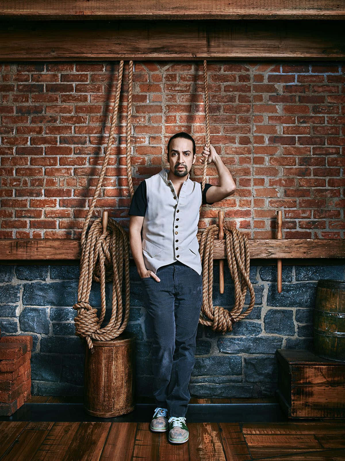 Lin-manuel Miranda, vest, brick and stone wall, HD Phone Wallpaper