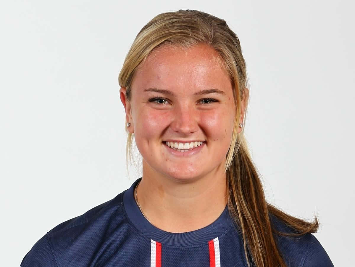 Lindsey Horan, navy blue sports jersey, red and white stripes, SD Desktop Wallpaper