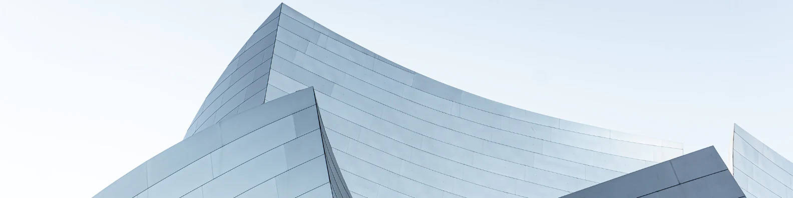 futuristic glass building, sharp geometric angles, pale sky, HD Desktop Wallpaper