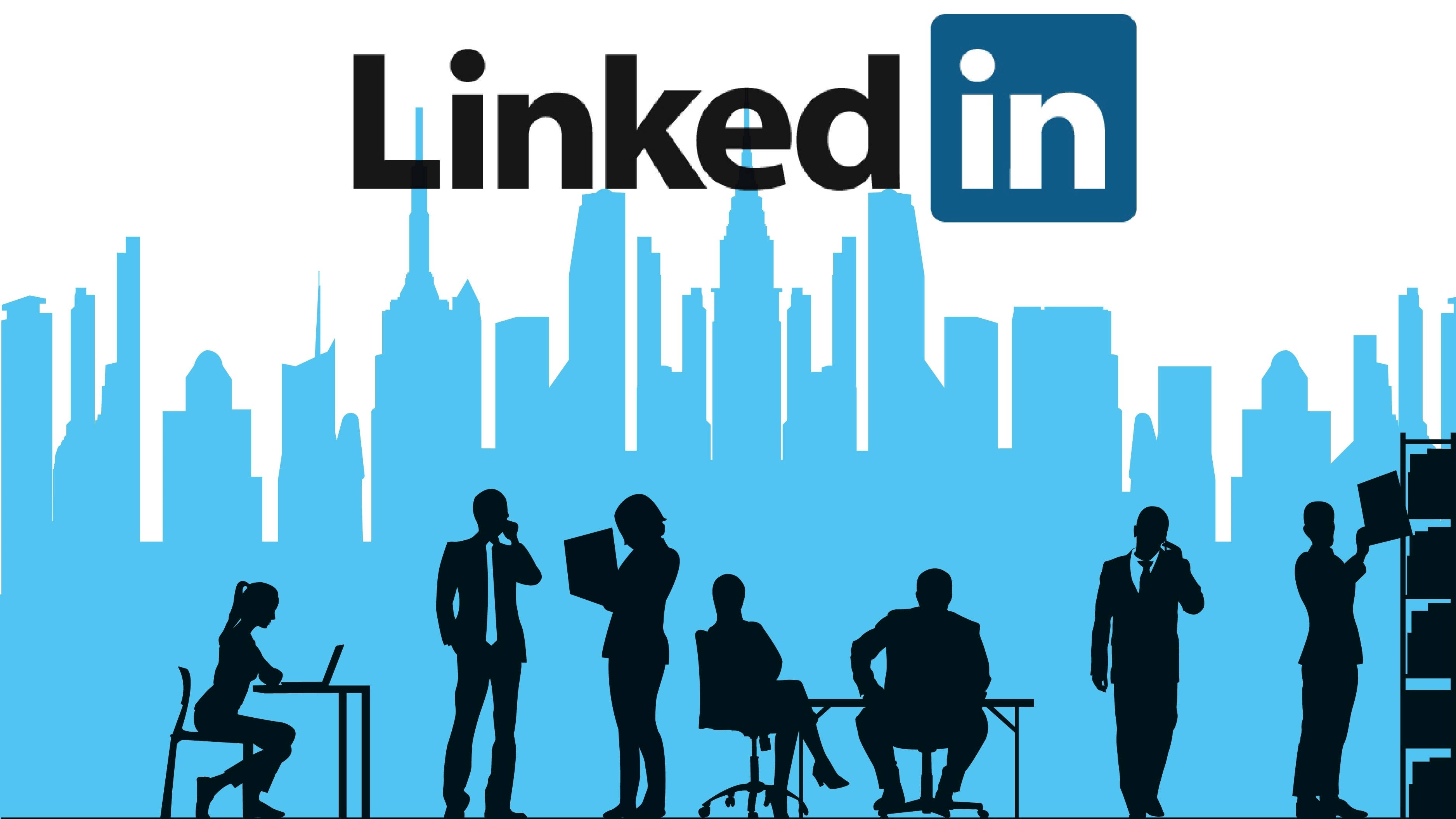 LinkedIn logo, blue city skyline, silhouetted professionals, 2K Desktop Wallpaper