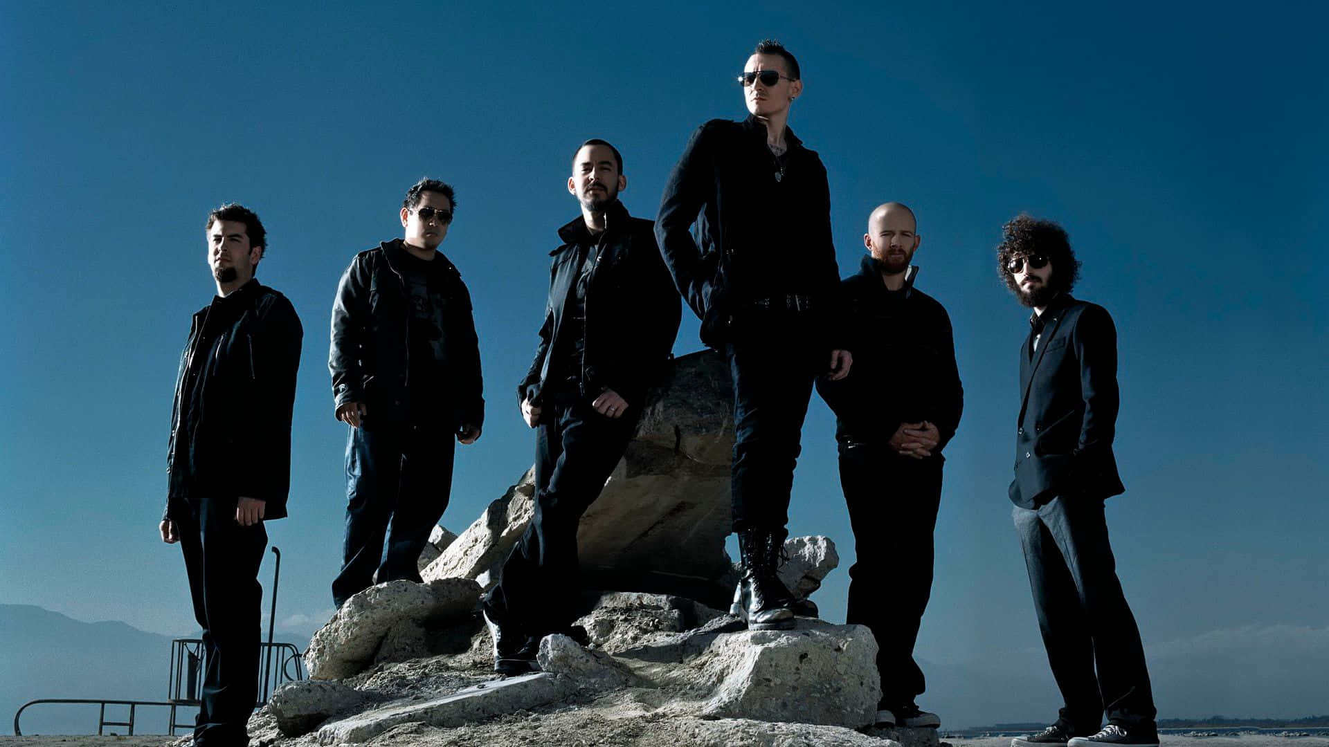 Linkin Park, black attire, rocky outcrop, Full HD Desktop Wallpaper