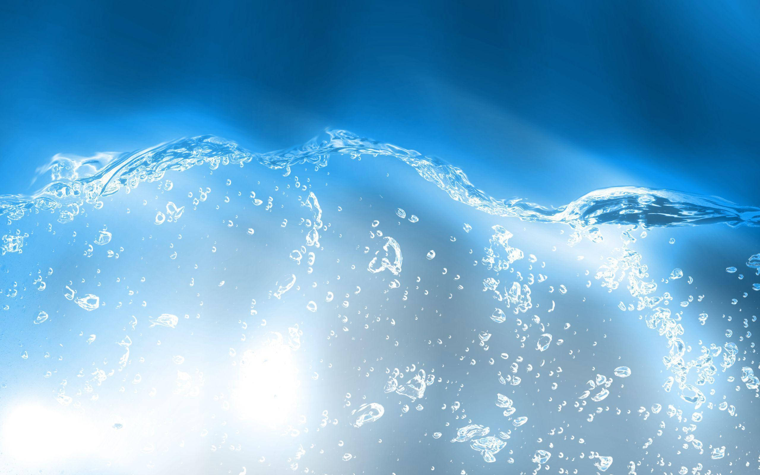 liquid droplets spray, clear blue water, sparkling bubbles, 2K Desktop Wallpaper