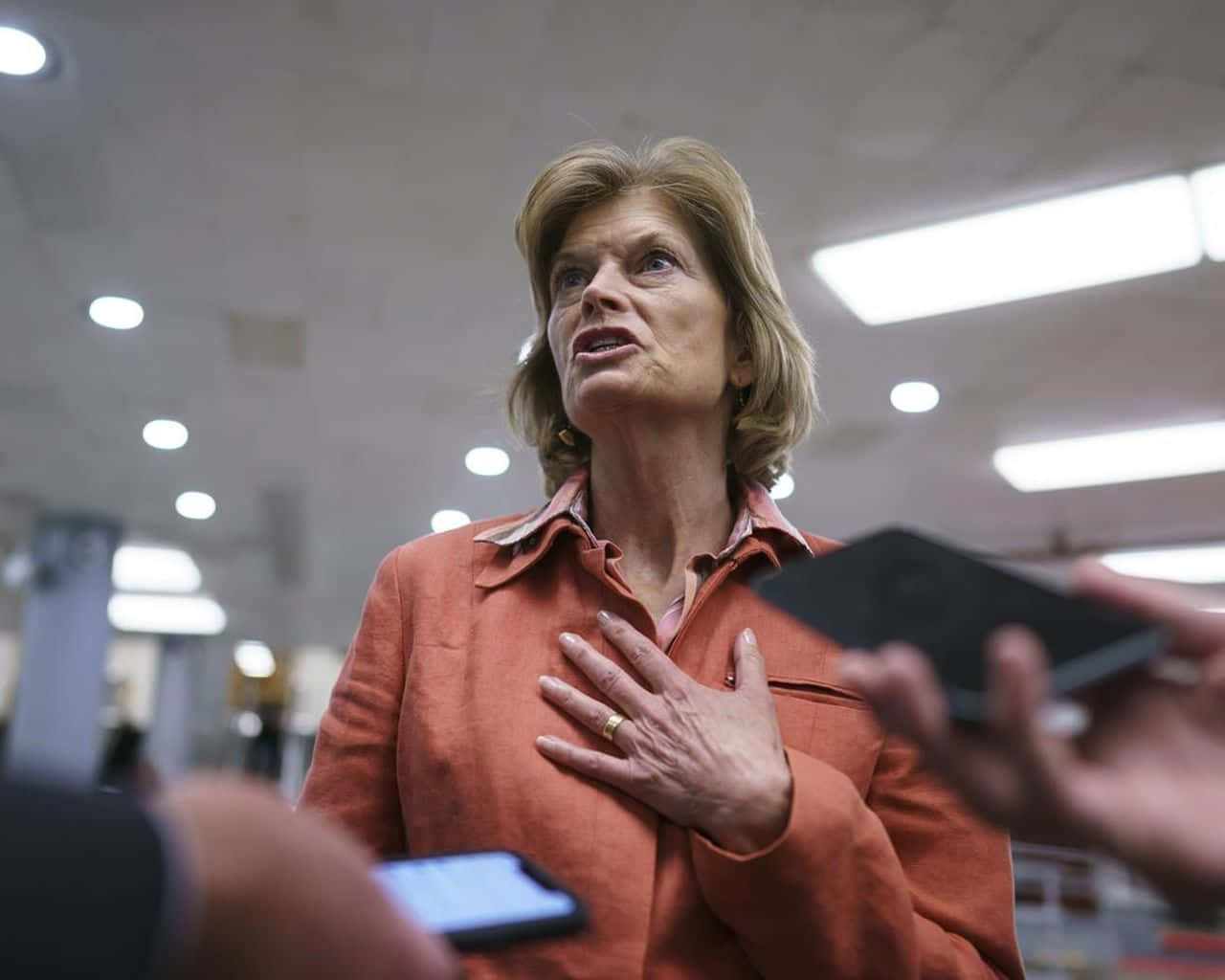 Lisa Murkowski, orange jacket, hand over heart, HD Desktop Wallpaper