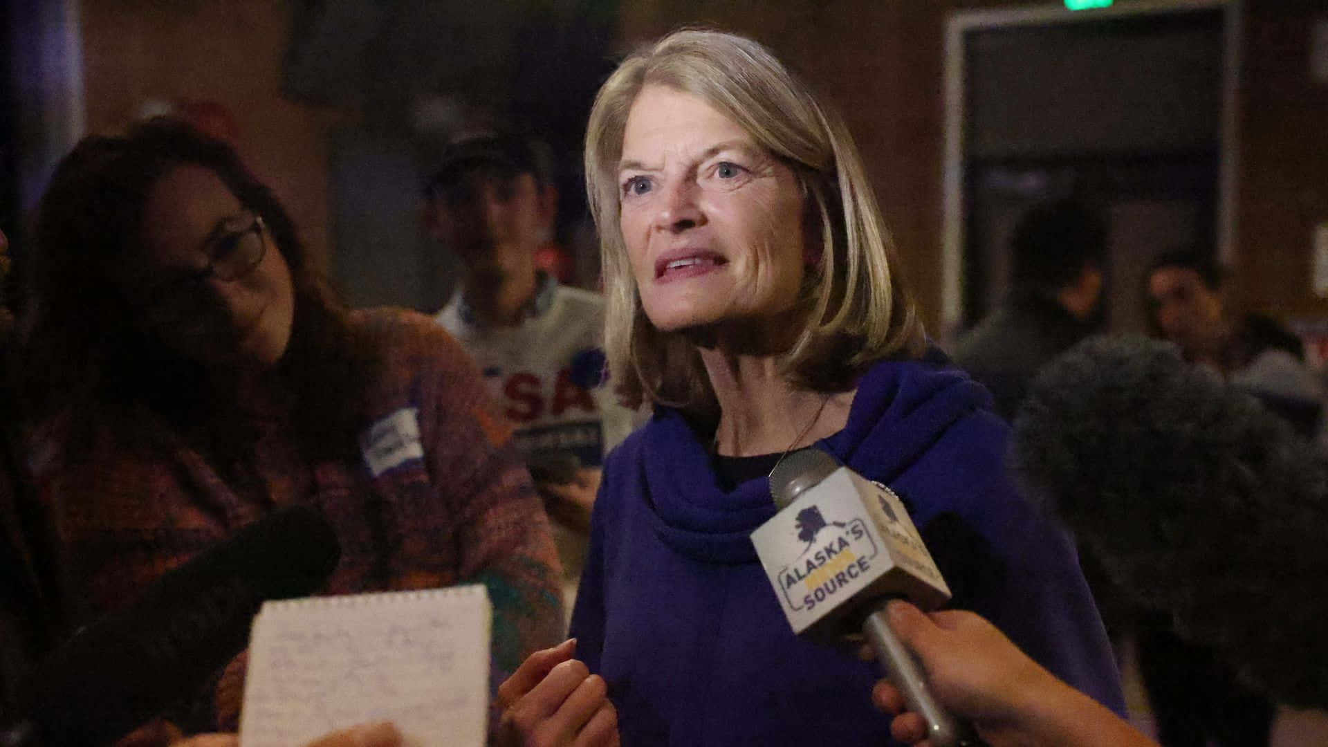 Lisa Murkowski, purple hoodie, microphone labeled Alaska Source, Full HD Desktop Wallpaper