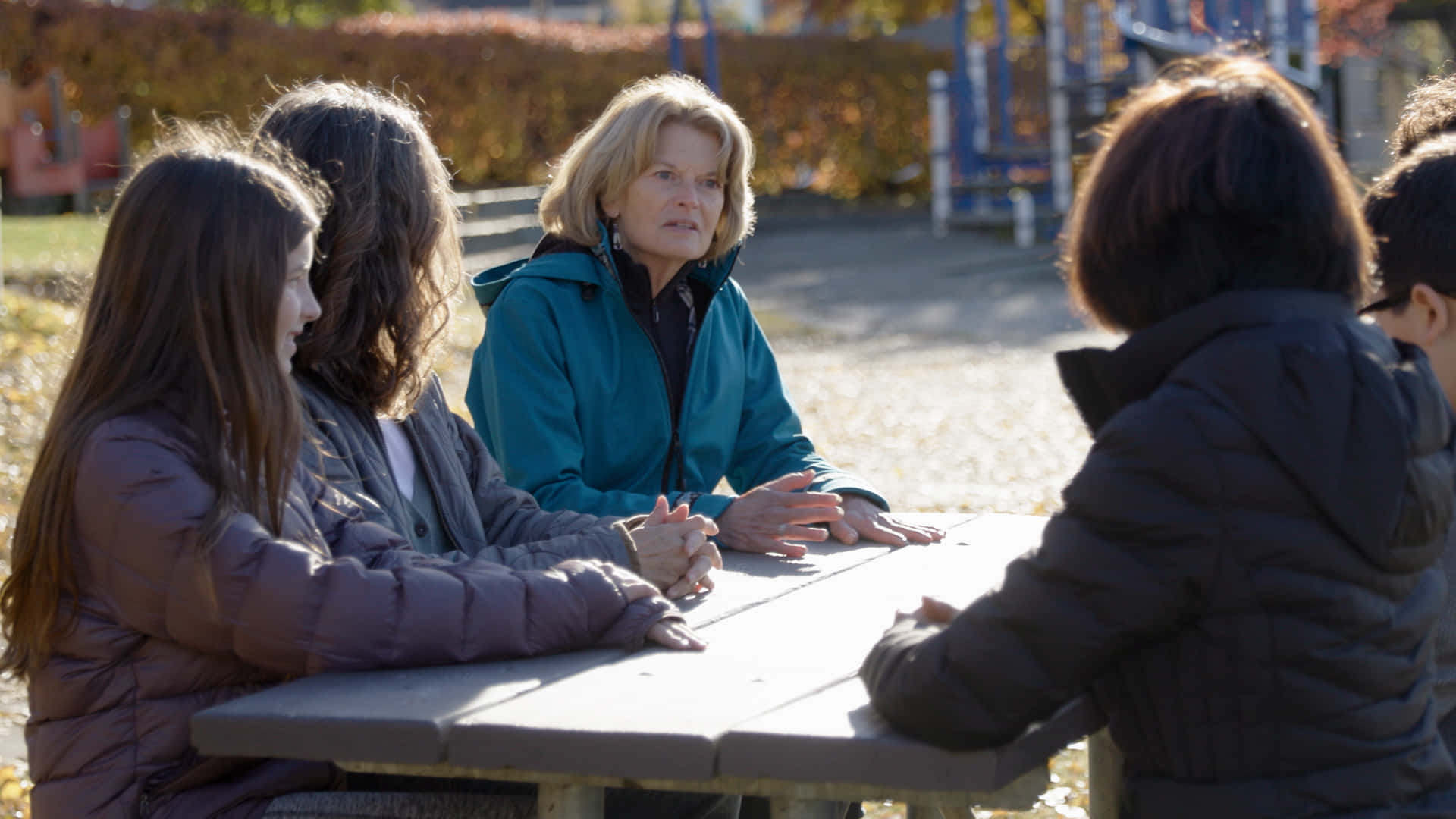 Lisa Murkowski, teal jacket, wooden picnic table, Full HD Desktop Wallpaper