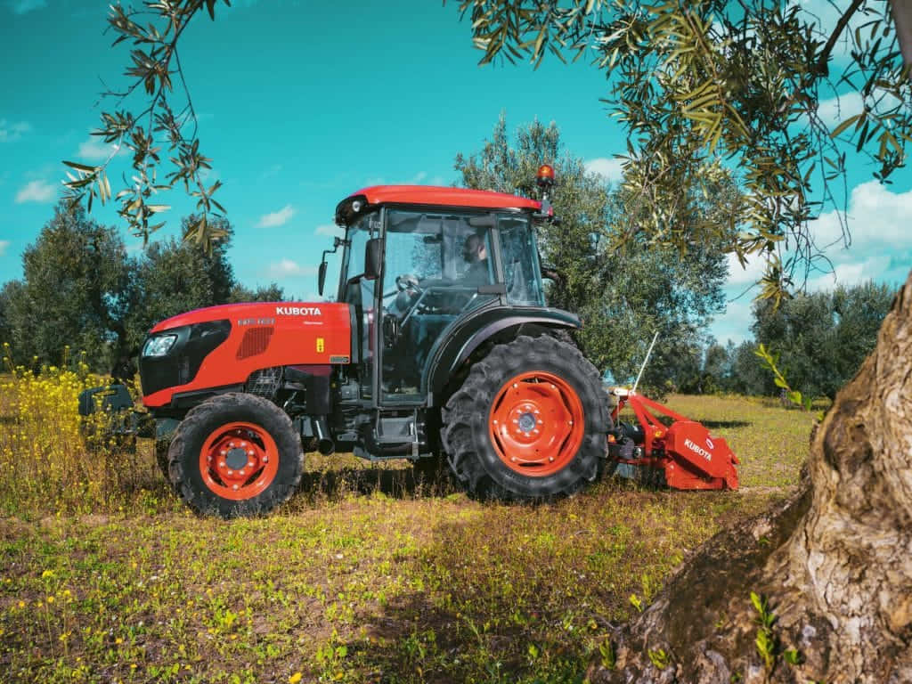 Lisburn United Kingdom, vibrant red Kubota tractor, sunlit field, SD Desktop Wallpaper