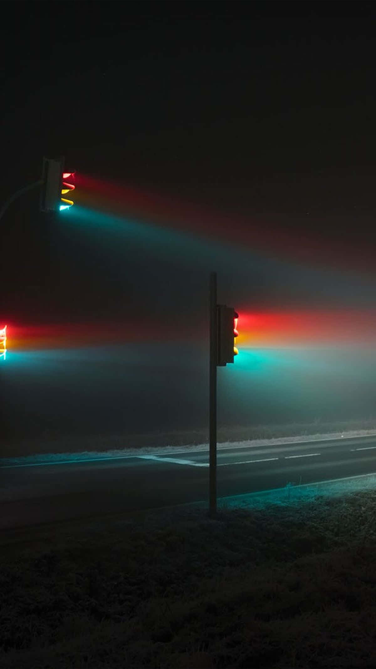 Lit iPhone, frosty night road, glowing traffic lights, Full HD Phone Wallpaper