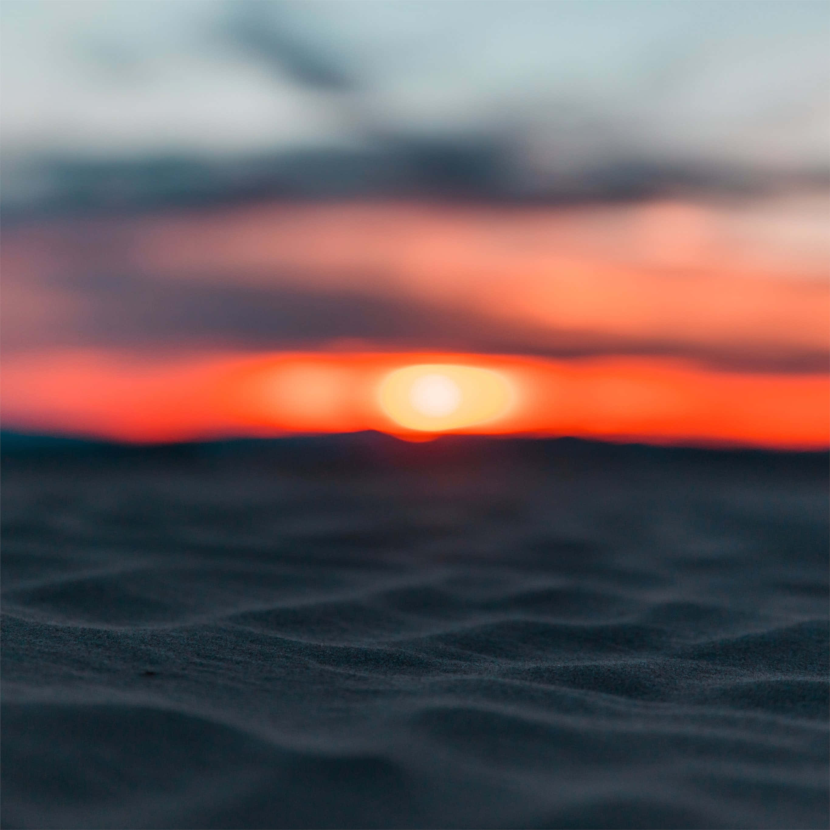 Lit iPhone, Sunset, Orange light, 2K Desktop Wallpaper
