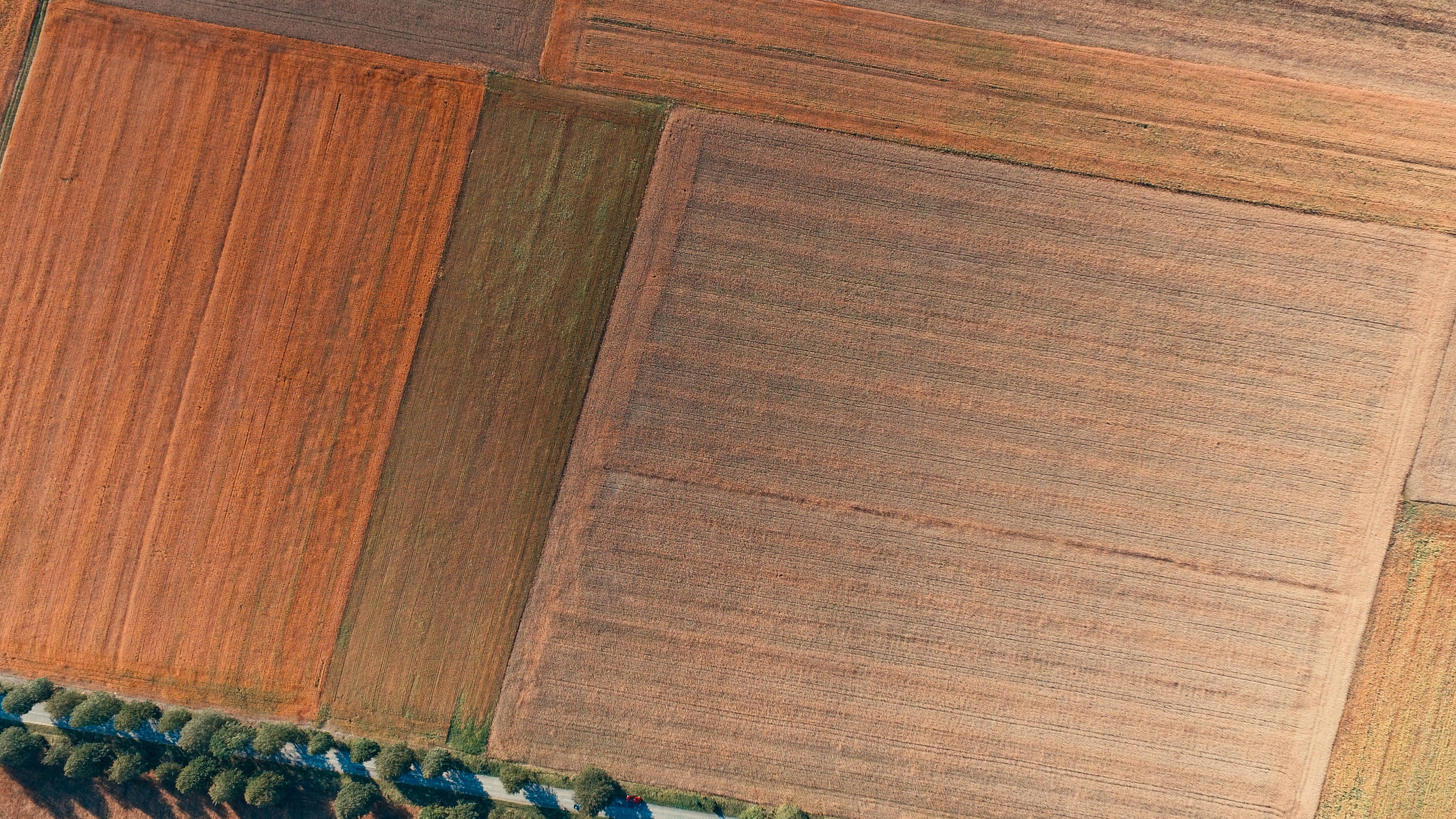 Lithuania, aerial view, geometrically patterned crop fields, 4K Desktop Wallpaper