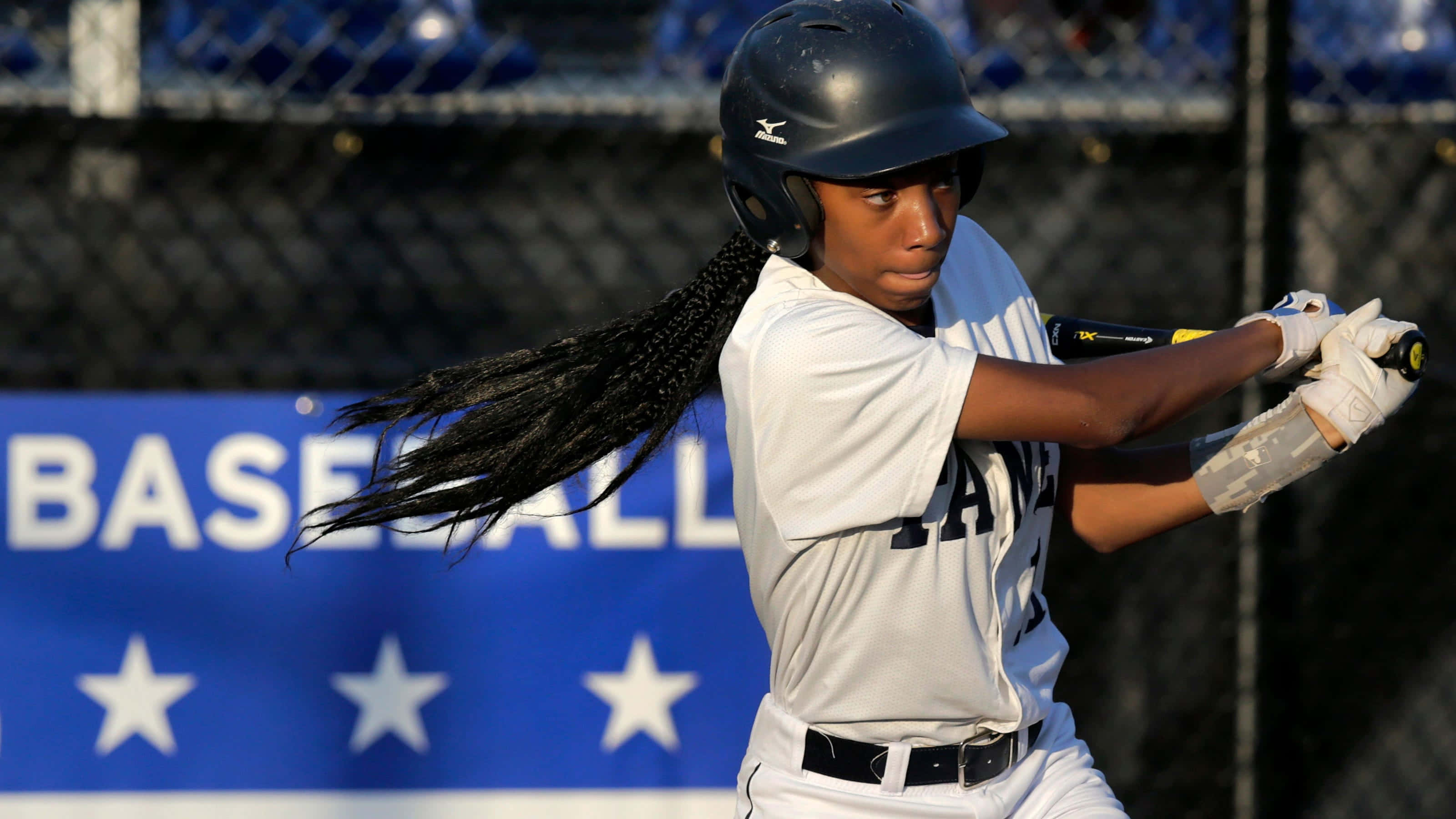 Little League Baseball, female softball player, flowing braids, 2K Desktop Wallpaper