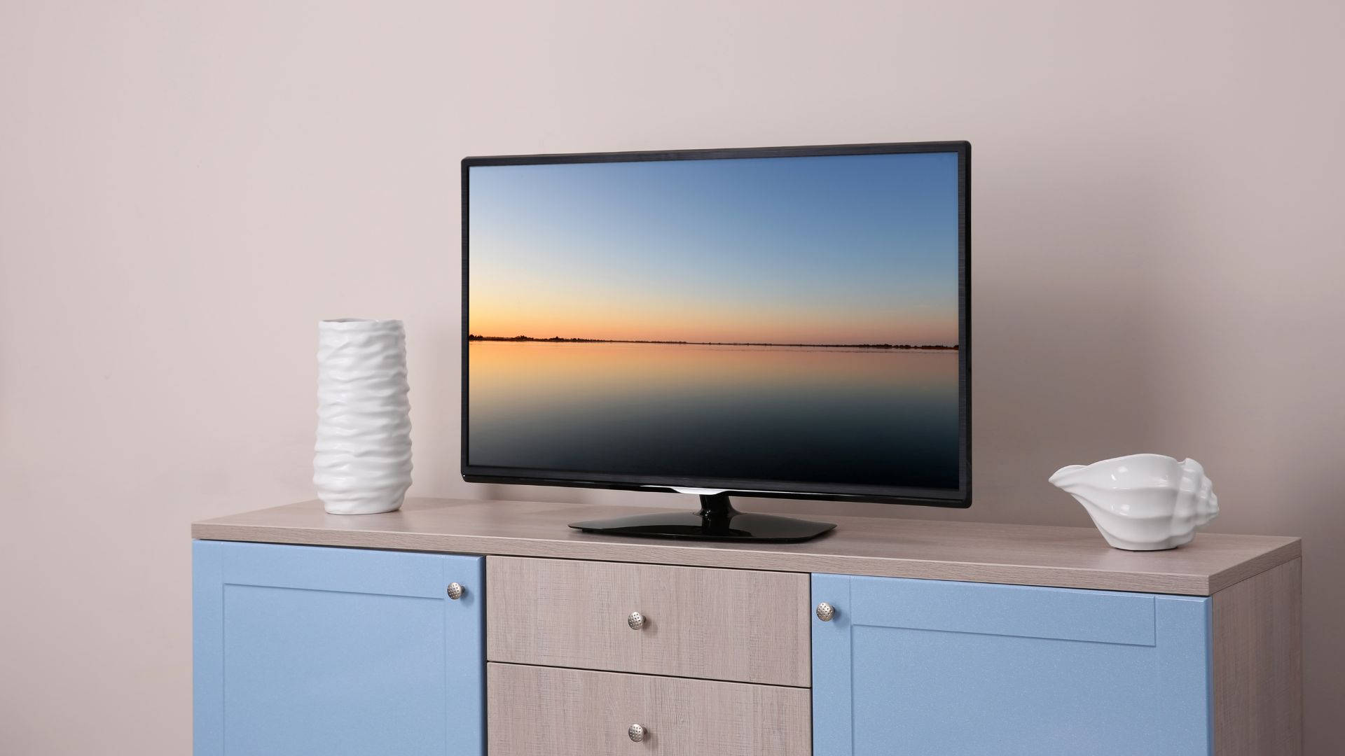 32 inch led full hd tv, serene sunset over water, light wood cabinet, Full HD Desktop Wallpaper