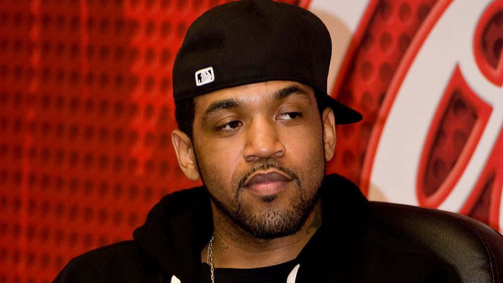 Lloyd Banks, black cap, red perforated wall, SD Desktop Wallpaper