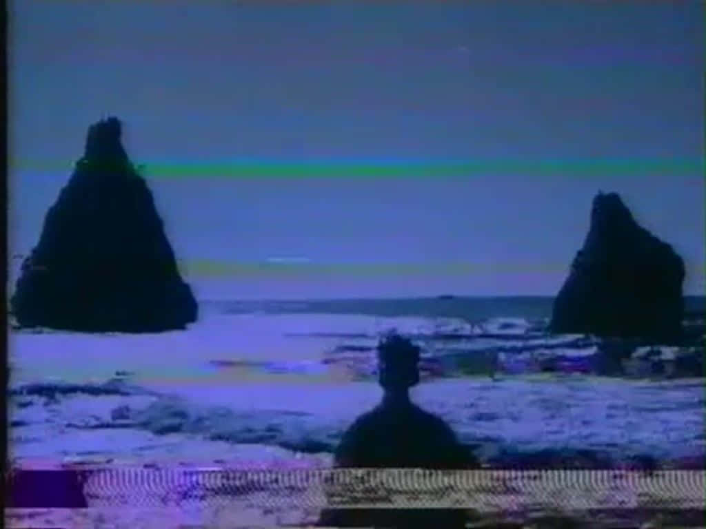 vintage TV screen, silhouetted person, jagged sea stacks, SD Desktop Wallpaper