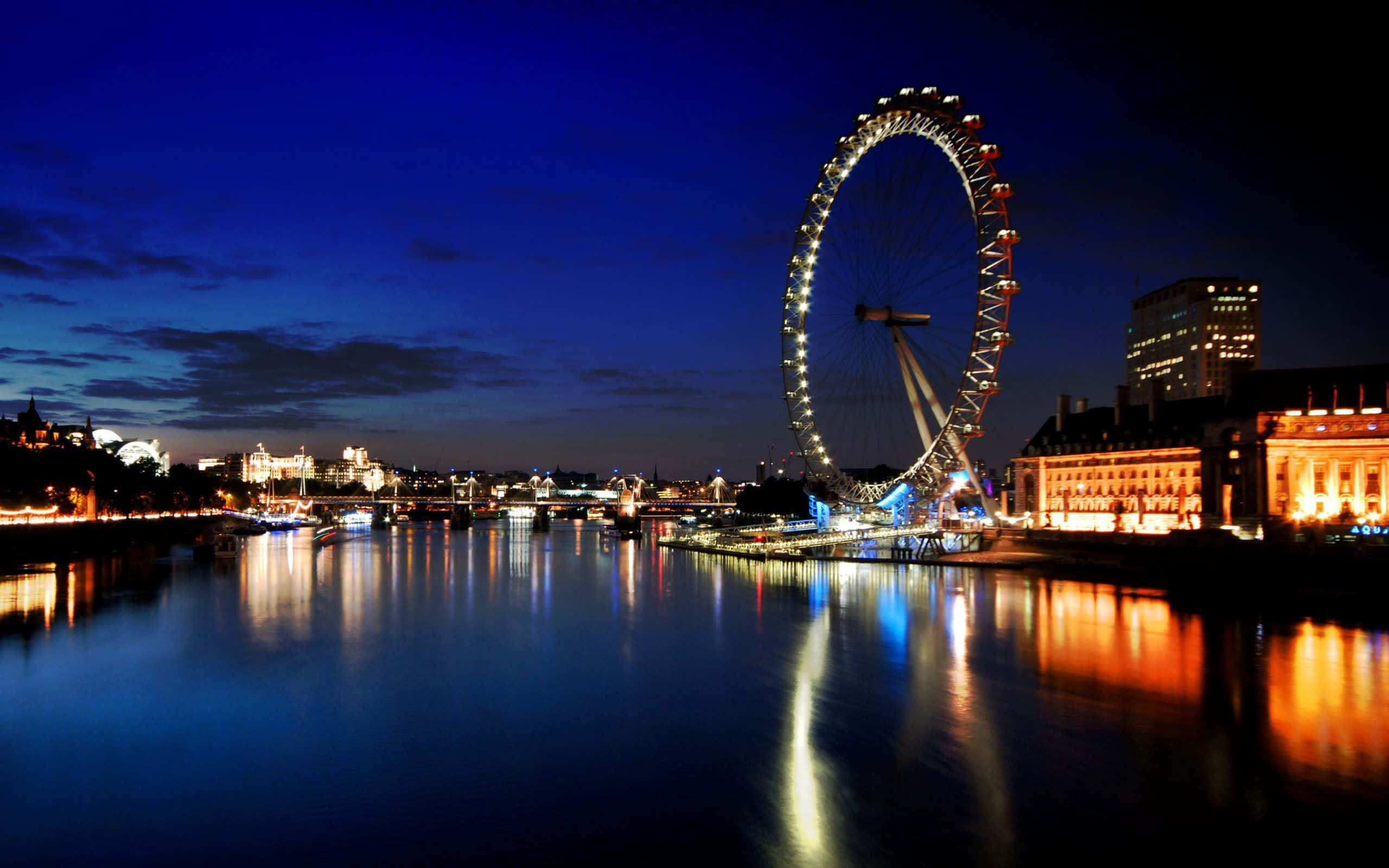 London Eye, deep blue twilight sky, calm Thames River, 2K Desktop Wallpaper