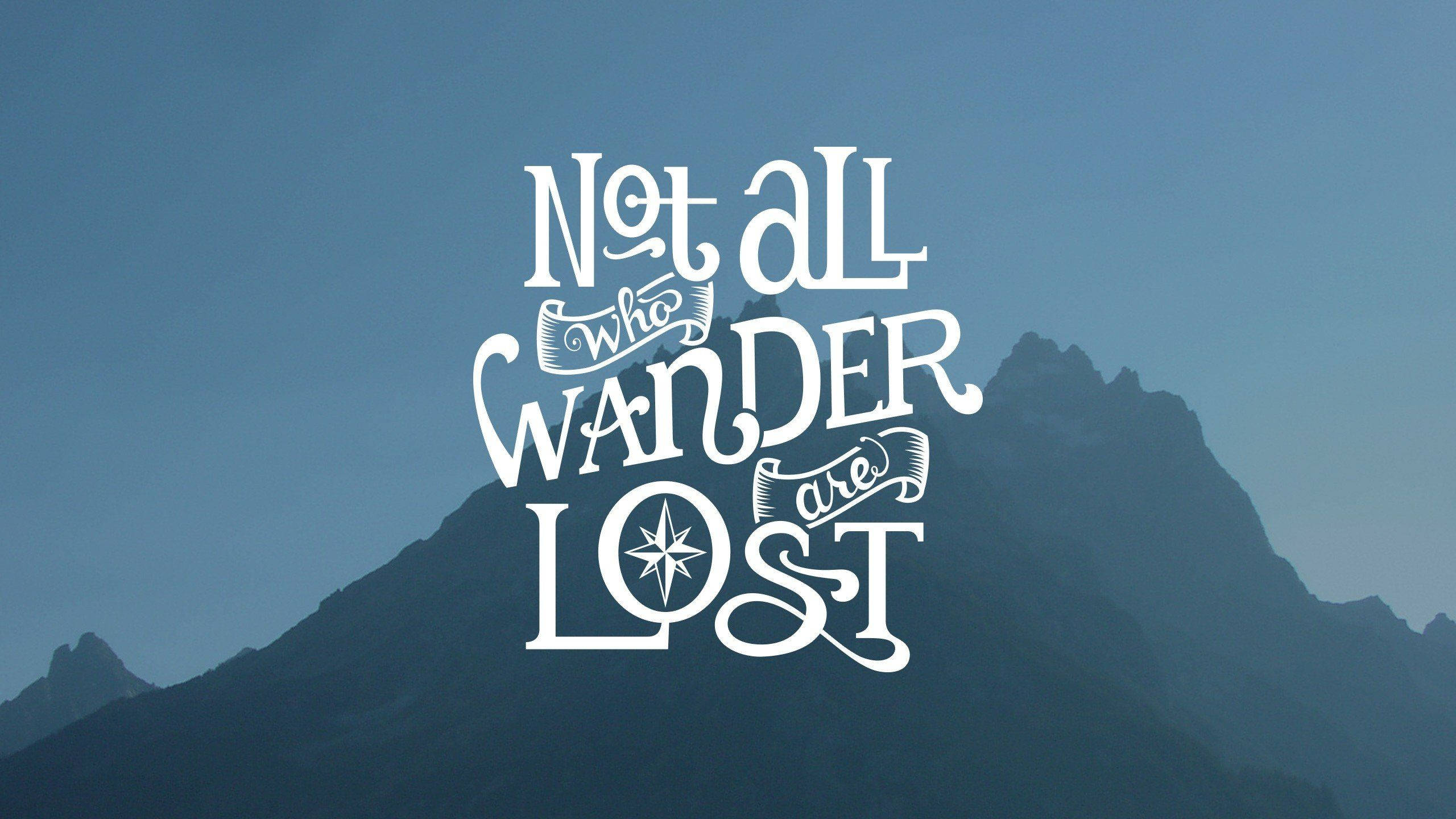 mountain peak, hazy blue sky, elegant white calligraphy, 2K Desktop Wallpaper