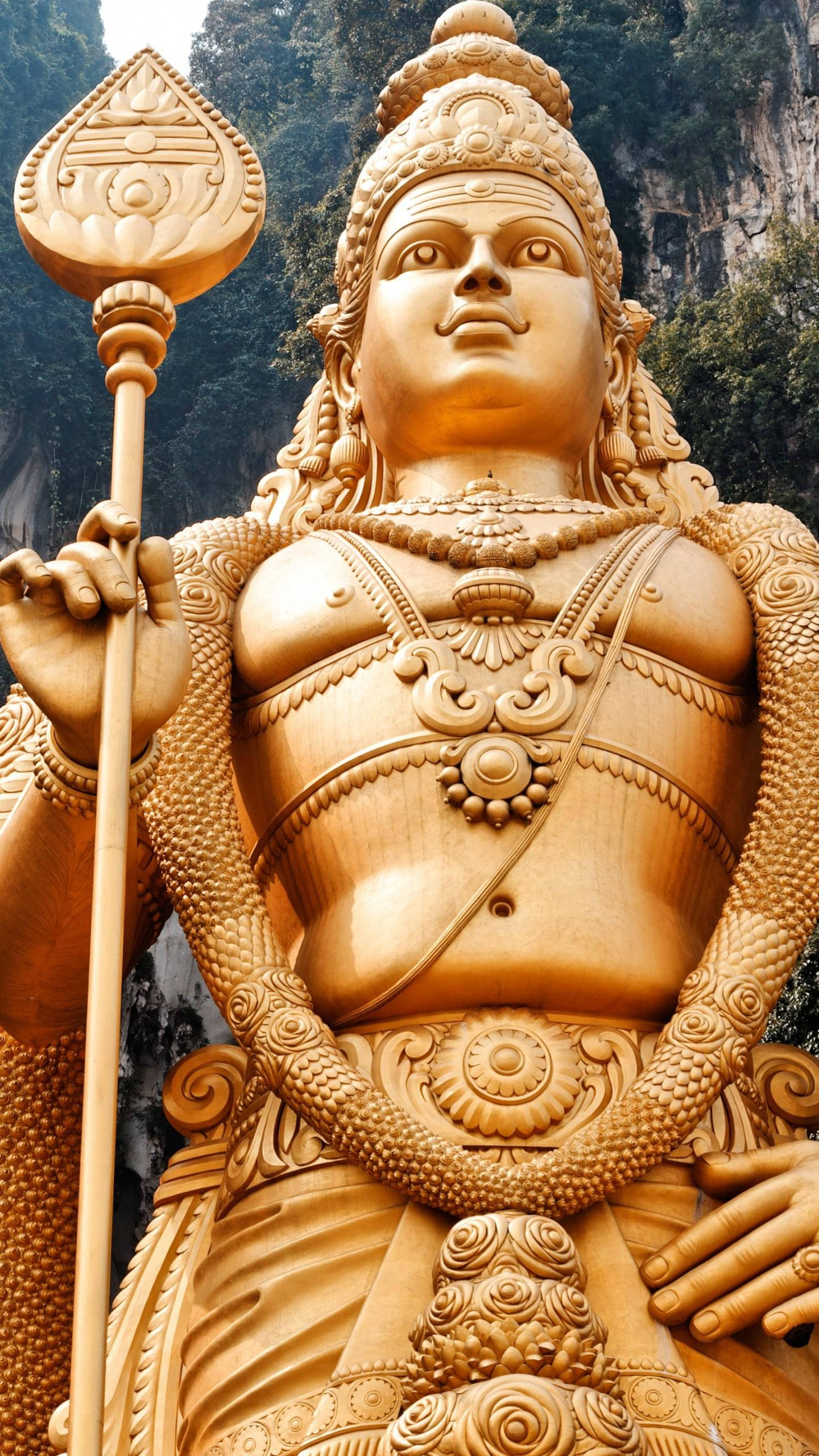 Lord Murugan, golden statue, staff, 2K Phone Wallpaper