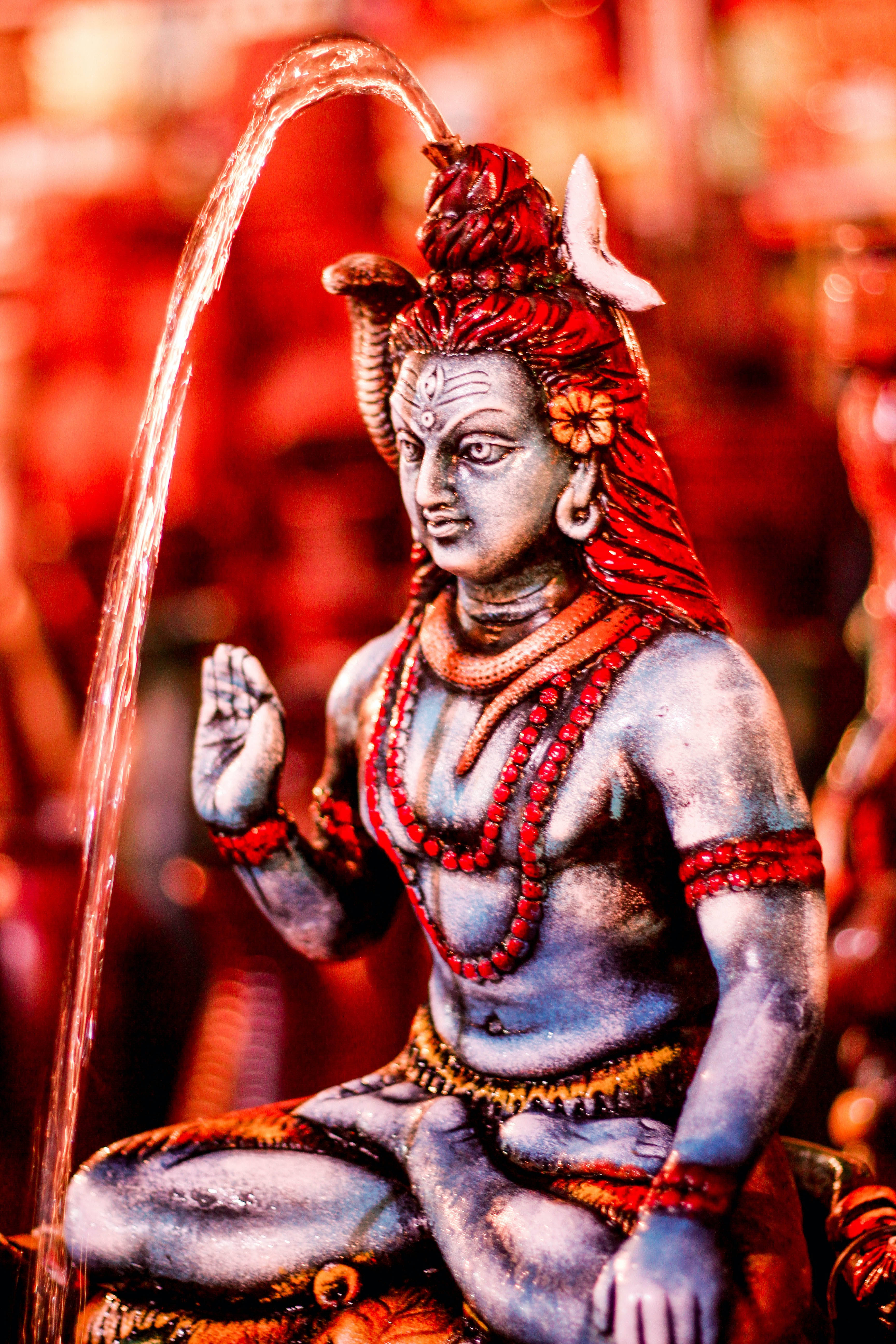 Lord Shiva, blue-skinned, red adornments, 5K Phone Wallpaper