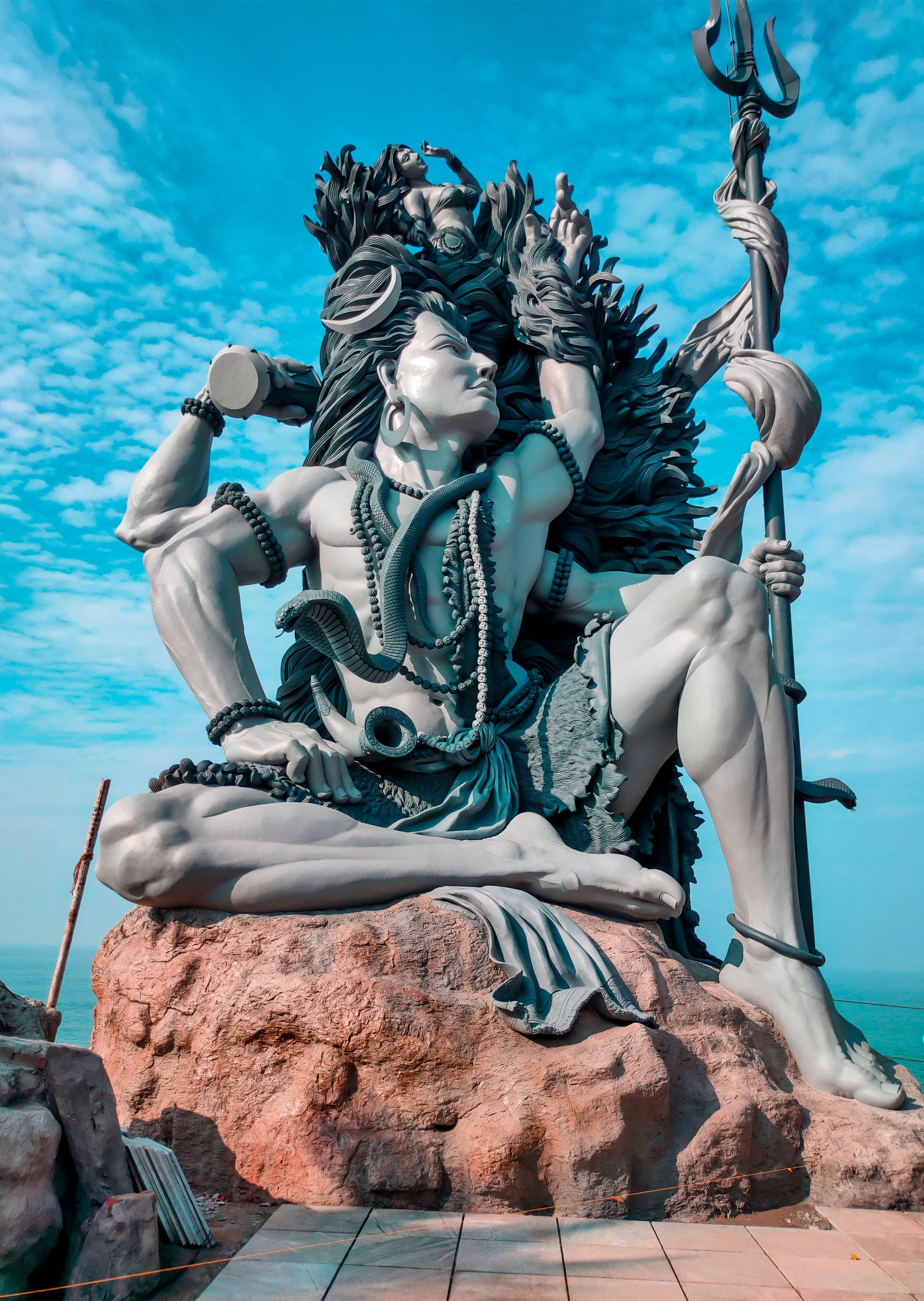 Lord Shiva, stone statue, meditative pose, 2K Phone Wallpaper