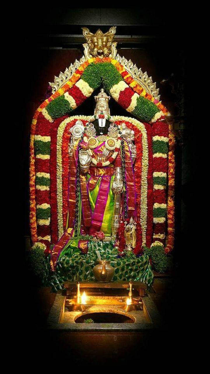 Lord Venkateswara, vibrant floral garlands, glowing oil lamps, HD Phone Wallpaper