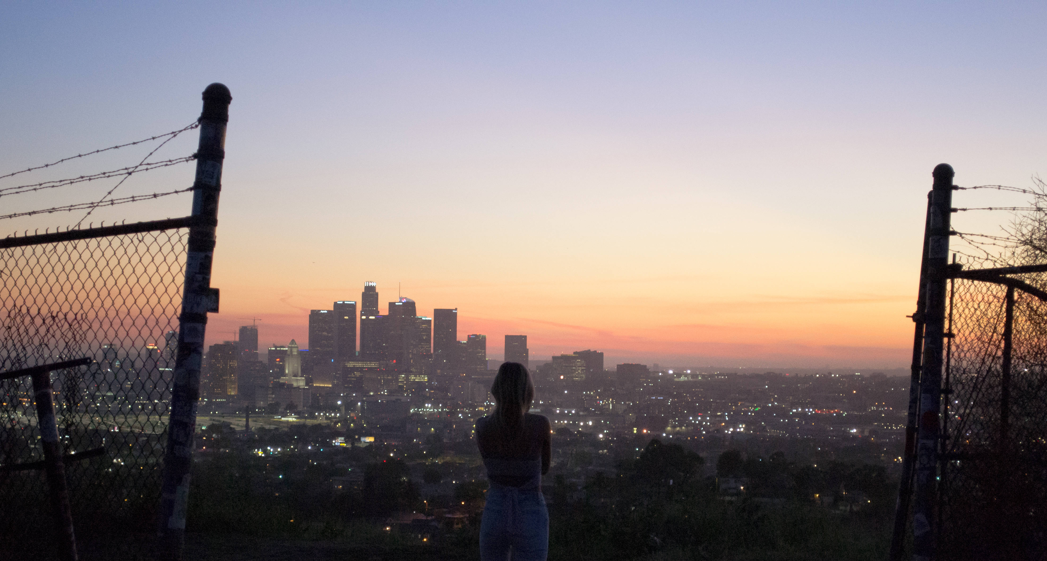 Los Angeles Skyline, dusk, chain-link fence, 4K Desktop Wallpaper