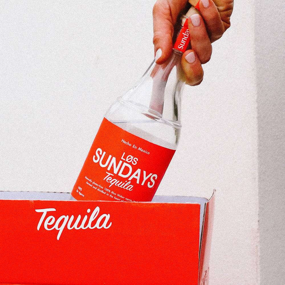 Los Sundays, red-labeled tequila bottle, matching red box, SD Desktop Wallpaper