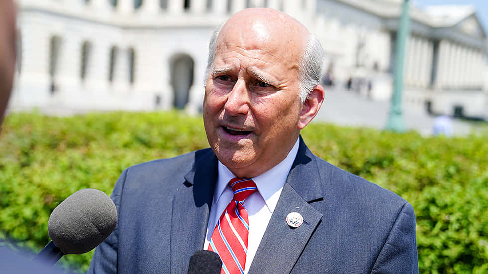Louie Gohmert, dark suit, red striped tie, SD Desktop Wallpaper