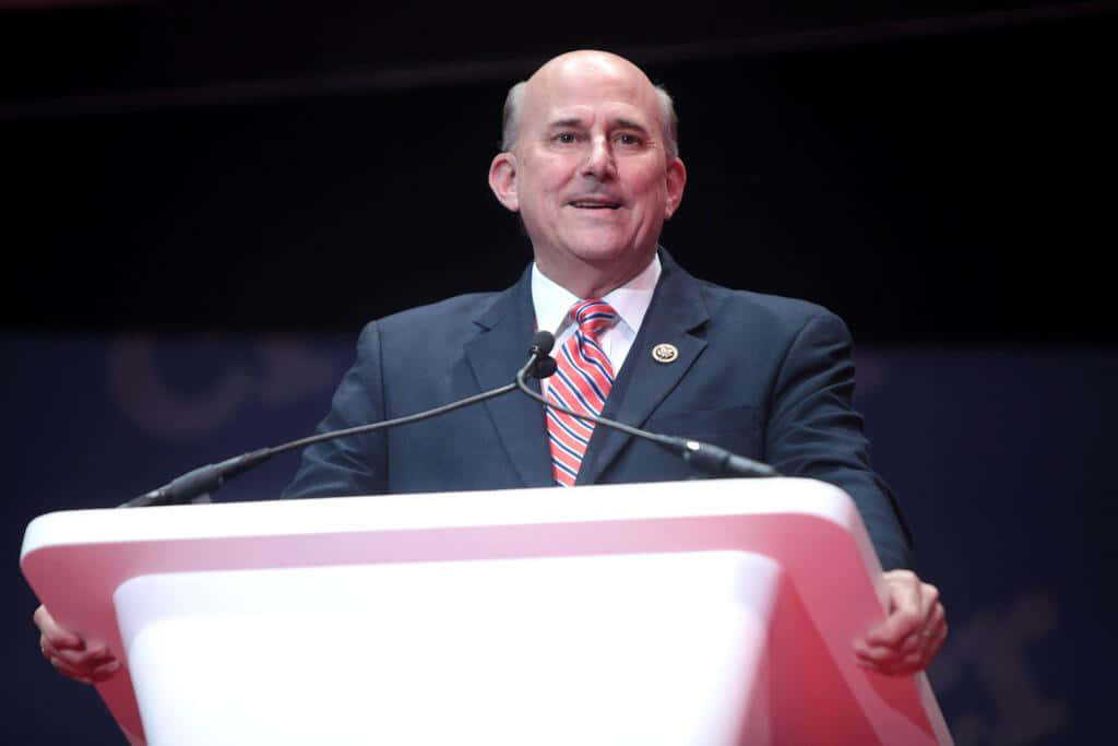 Louie Gohmert, white podium, dark suit, SD Desktop Wallpaper