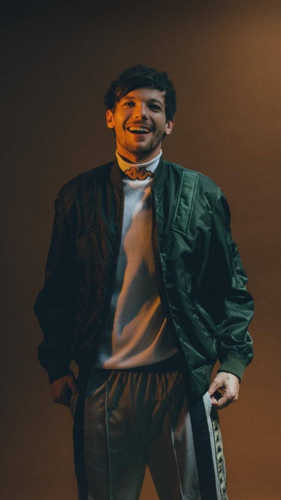 Louis Tomlinson, green bomber jacket, patterned pants, Full HD Phone Wallpaper