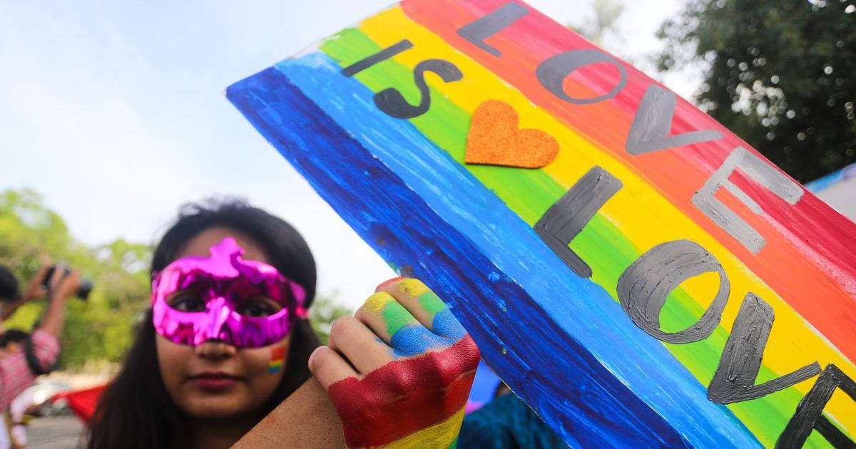 Love Is Love, rainbow-painted hands, vibrant rainbow sign, SD Desktop Wallpaper