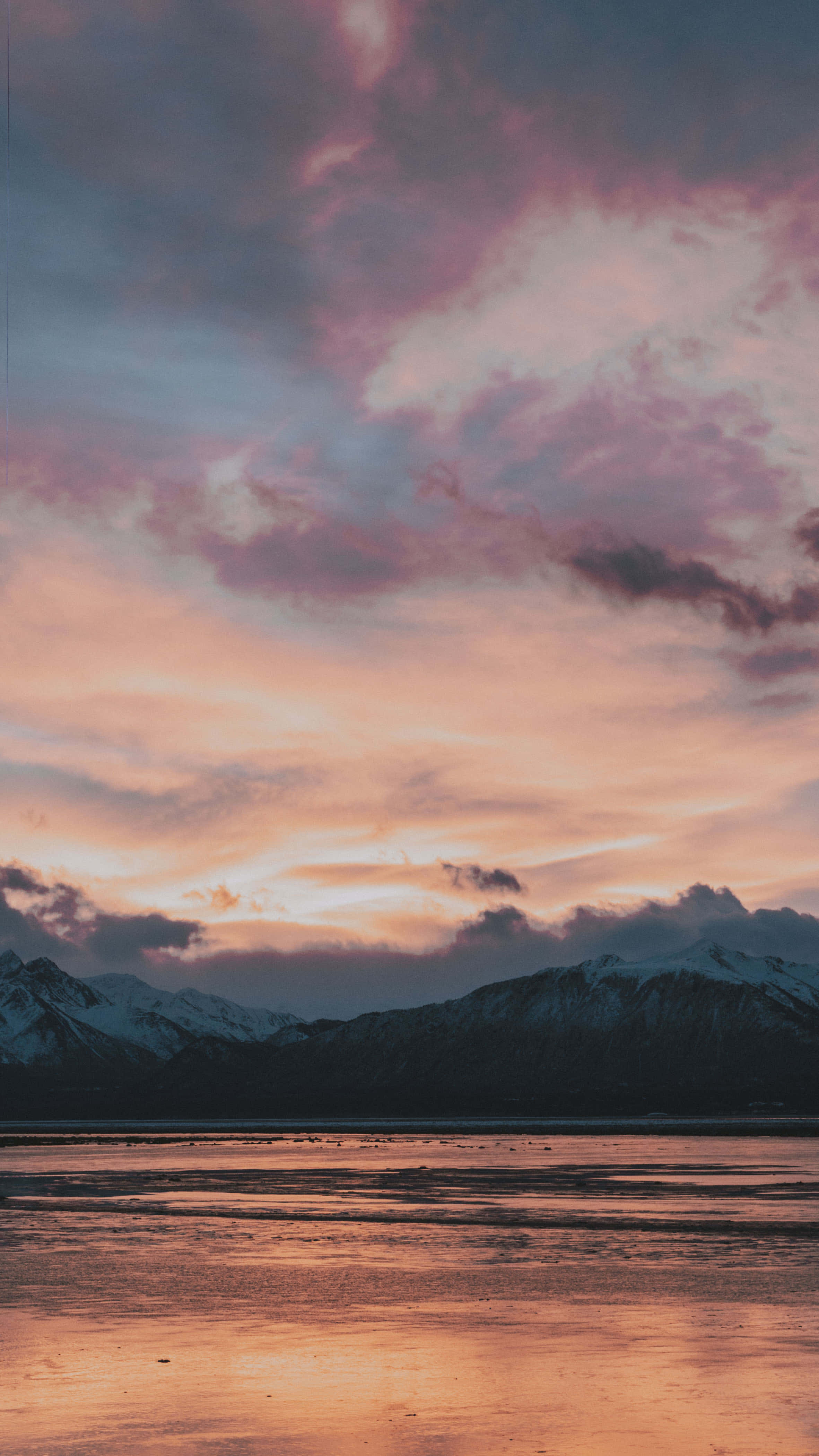 serene sunset, pink and orange hues, snow-capped mountains, 4K Phone Wallpaper