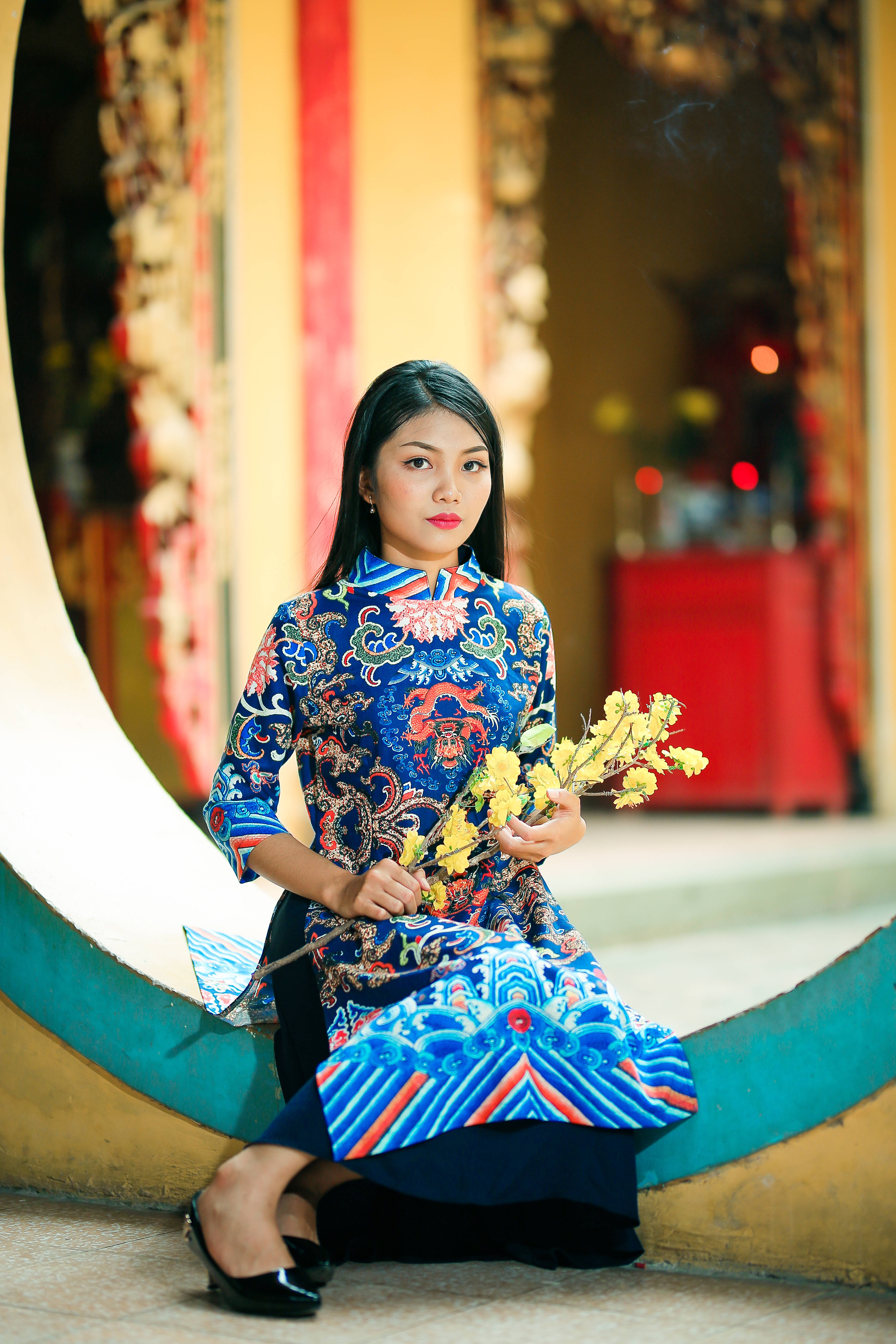 traditional Vietnamese dress, vibrant blue, yellow flowers, 5K Phone Wallpaper